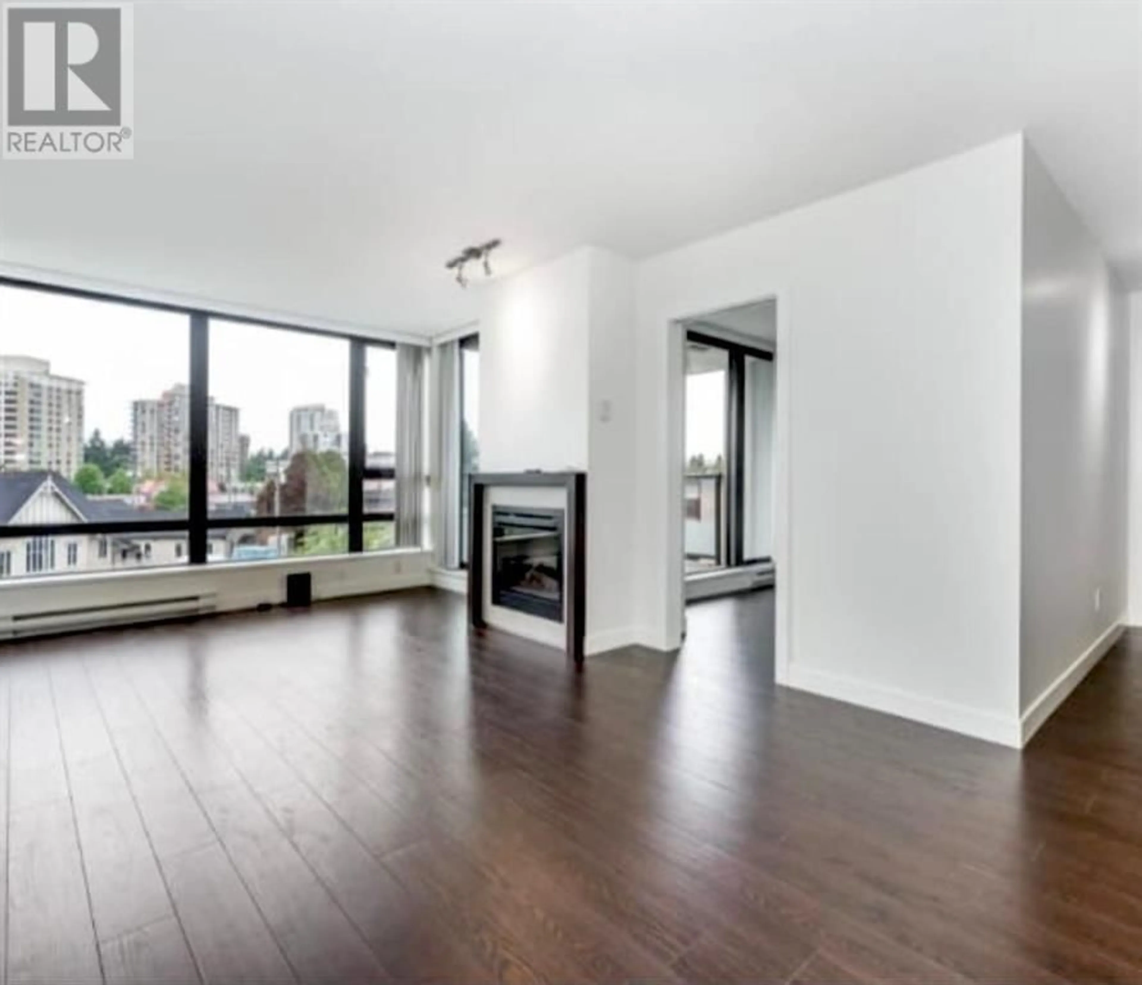 Living room with furniture, wood/laminate floor for 607 - 7325 ARCOLA STREET, Burnaby British Columbia V5E0A8