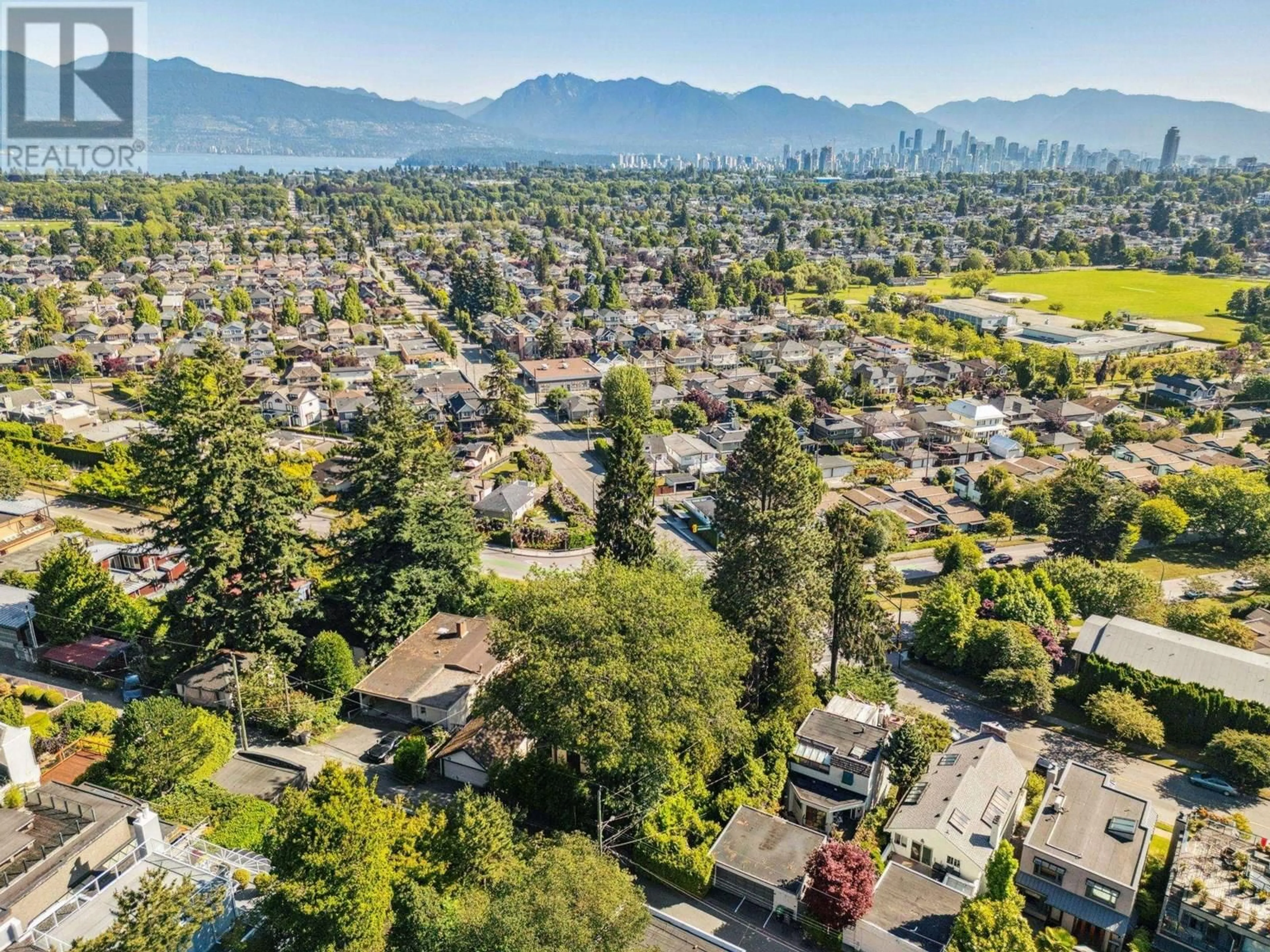 A pic from outside/outdoor area/front of a property/back of a property/a pic from drone, mountain view for 2806 KING EDWARD AVENUE, Vancouver British Columbia V6L1T9
