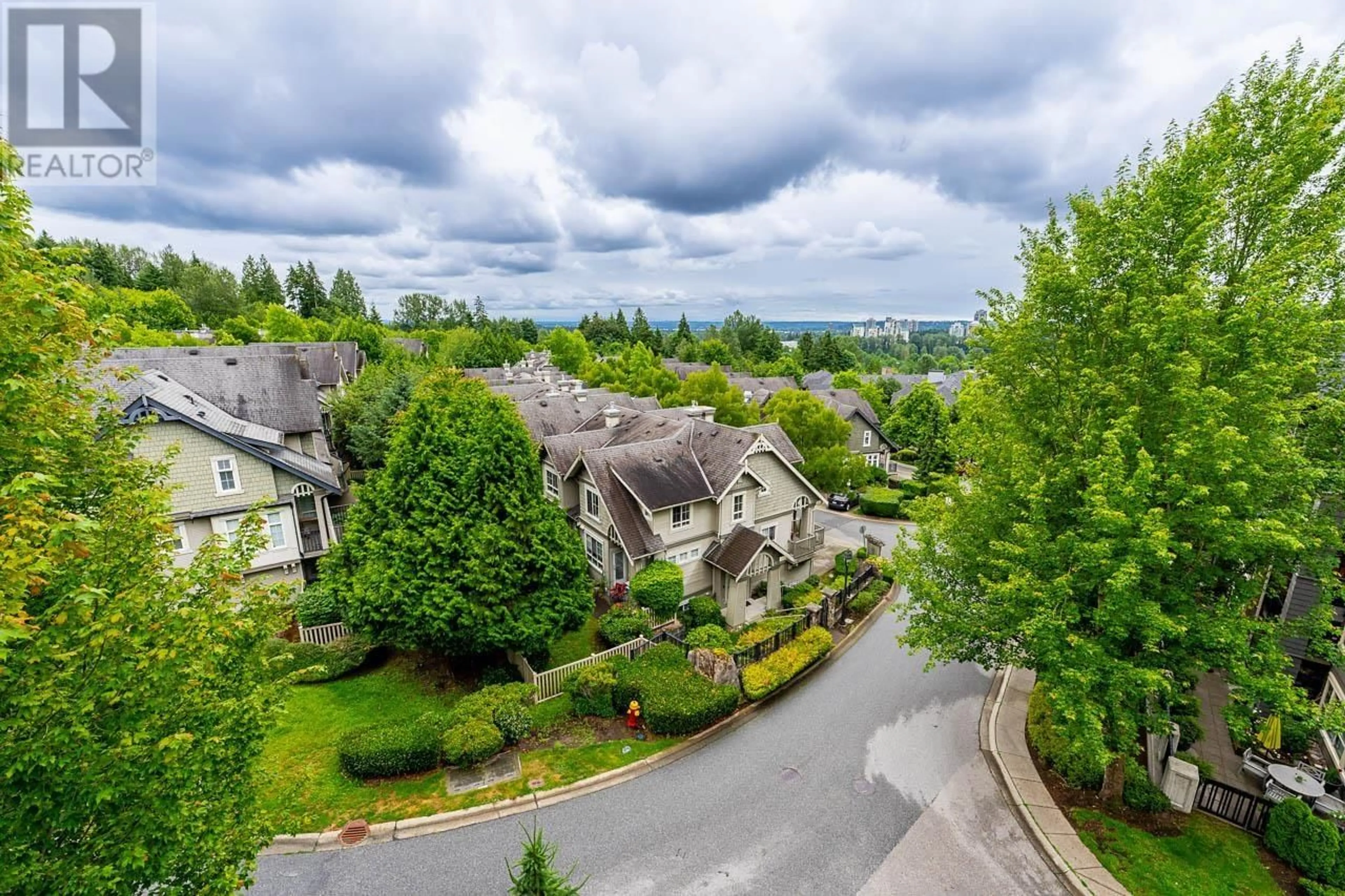 A pic from outside/outdoor area/front of a property/back of a property/a pic from drone, mountain view for 414 - 2969 WHISPER WAY, Coquitlam British Columbia V3E3S8