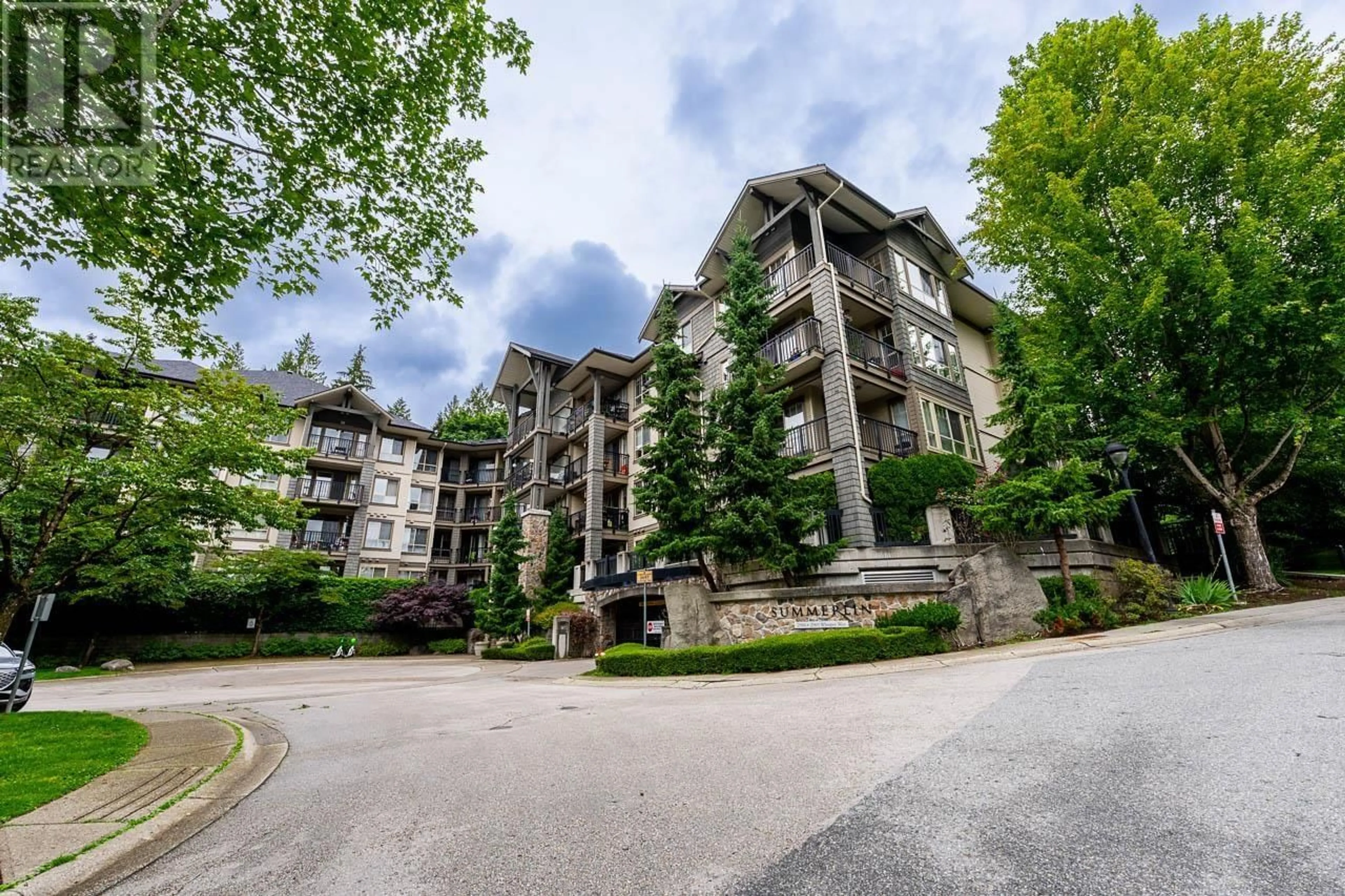 A pic from outside/outdoor area/front of a property/back of a property/a pic from drone, mountain view for 414 - 2969 WHISPER WAY, Coquitlam British Columbia V3E3S8