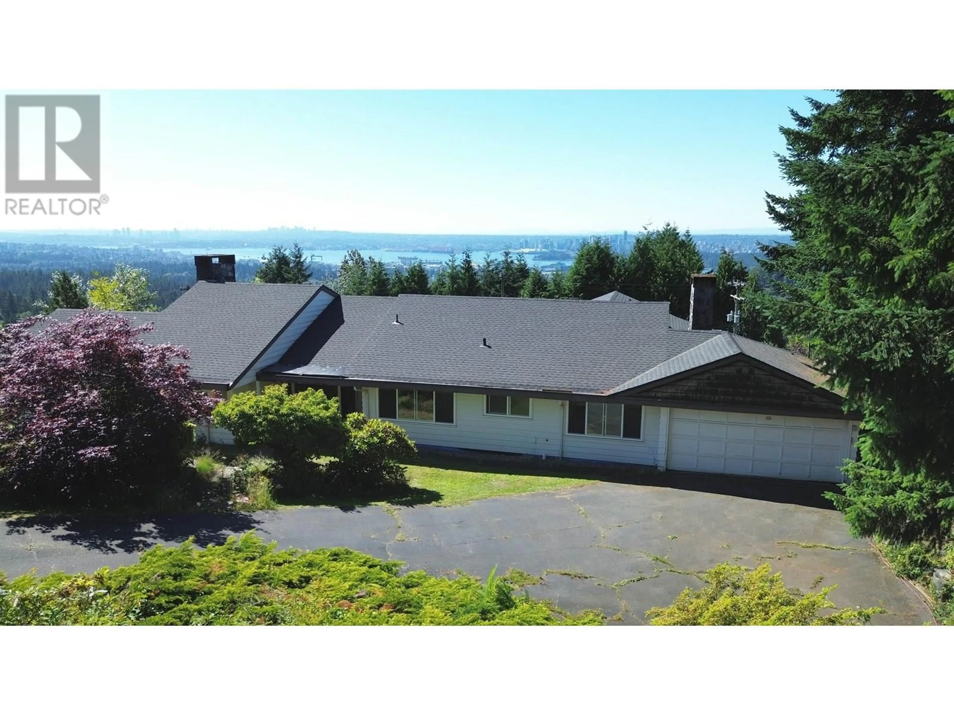 A pic from outside/outdoor area/front of a property/back of a property/a pic from drone, mountain view for 1028 EYREMOUNT DRIVE, West Vancouver British Columbia V7S2B3