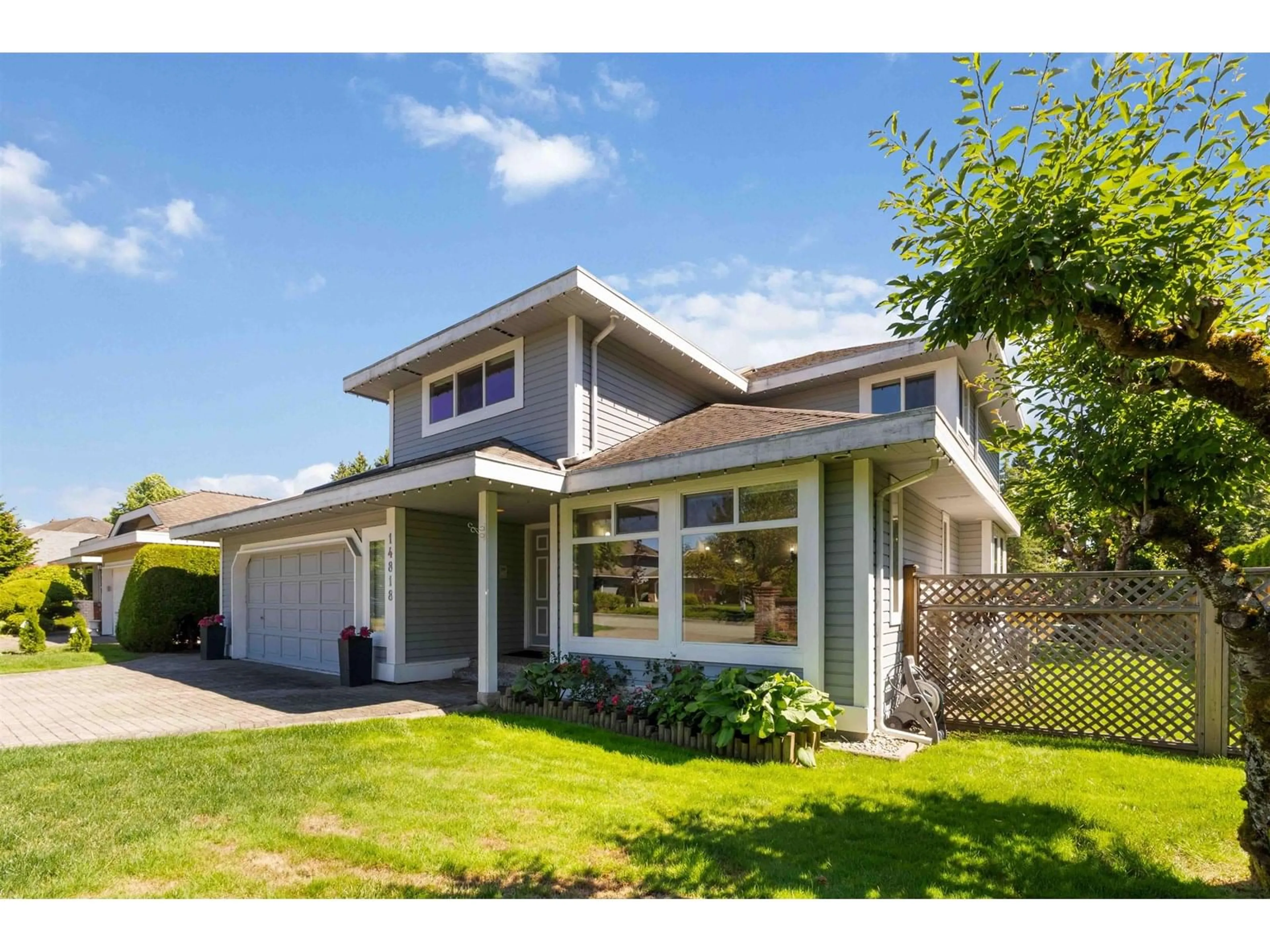 Home with vinyl exterior material, street for 14818 21A, Surrey British Columbia V4A8L6