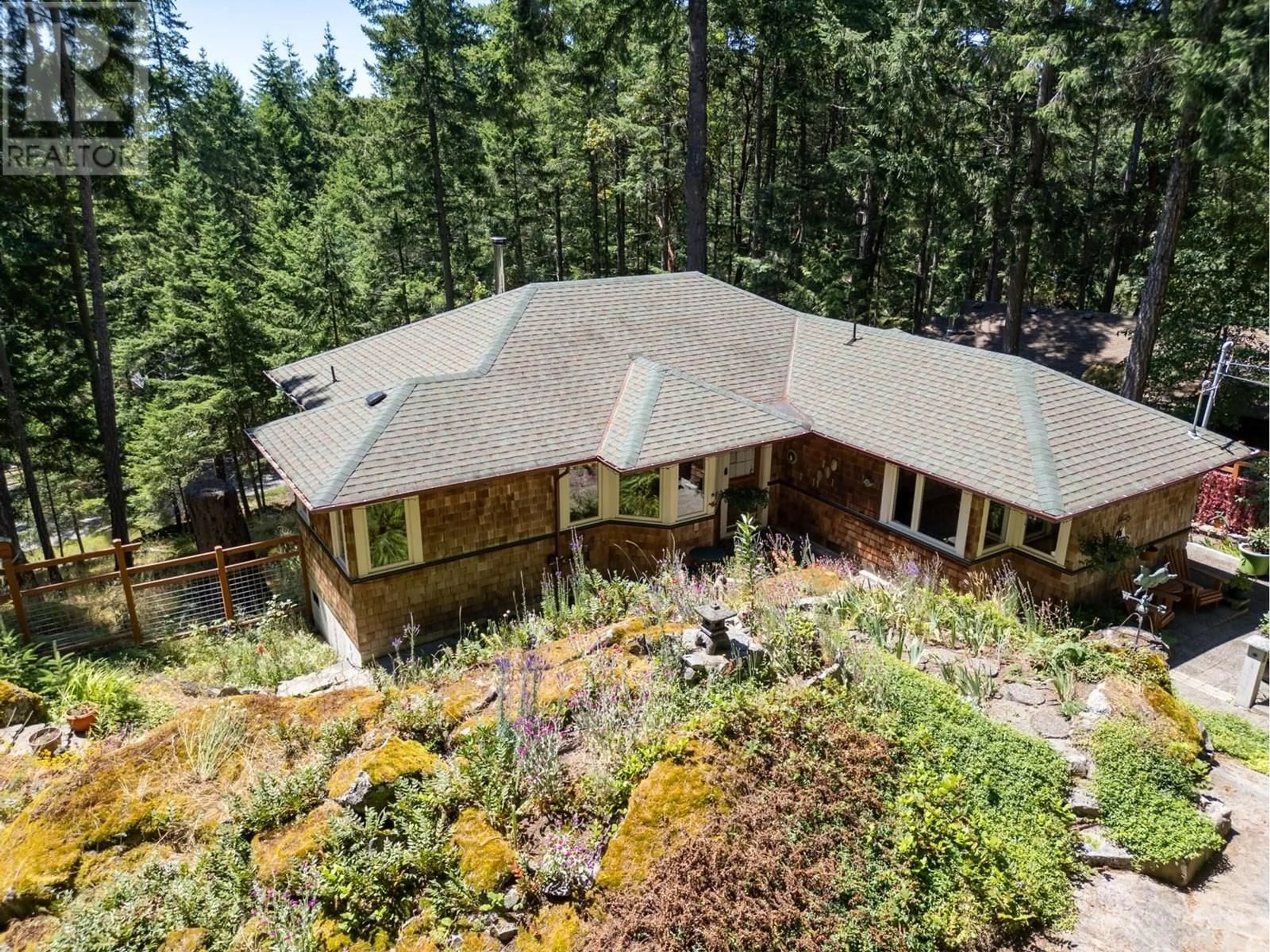 A pic from outside/outdoor area/front of a property/back of a property/a pic from drone, forest/trees view for 2622 LIGHTHOUSE LANE, Pender Island British Columbia V0N2M2