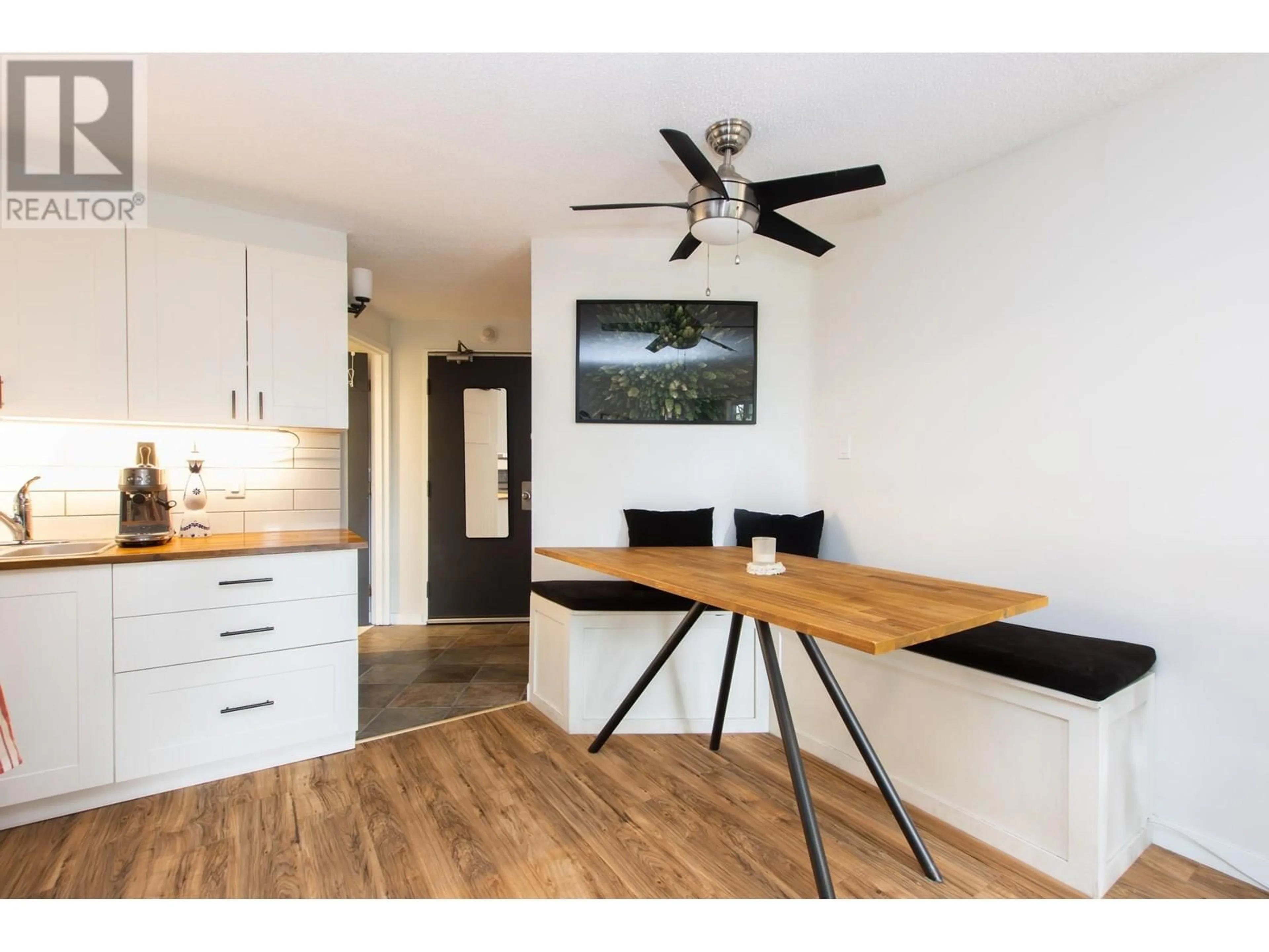 Open concept kitchen, wood/laminate floor for 112 - 2109 WHISTLER ROAD, Whistler British Columbia V8E0A6
