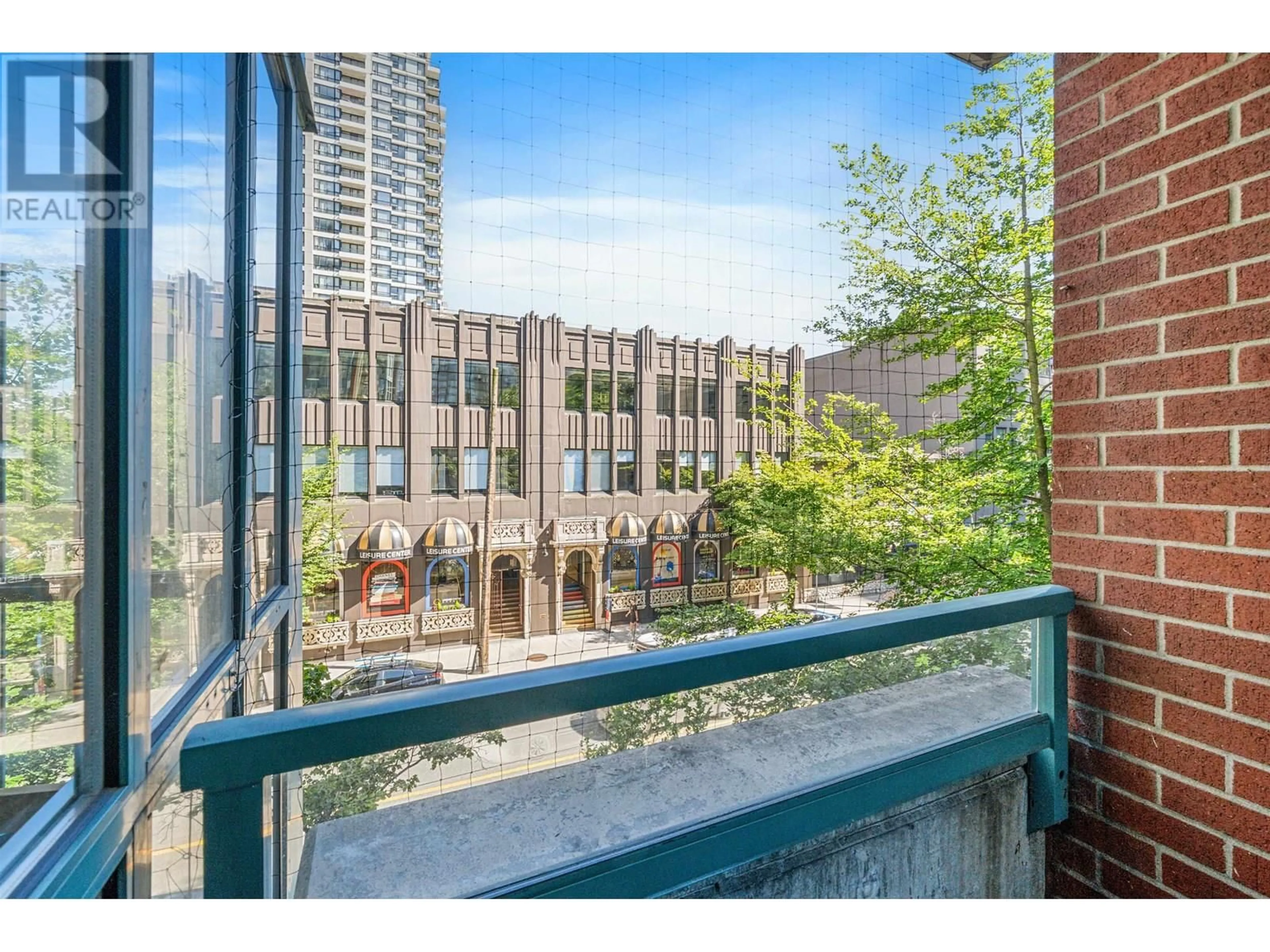 Patio, city buildings view from balcony for 304 - 939 HOMER STREET, Vancouver British Columbia V6B2W6