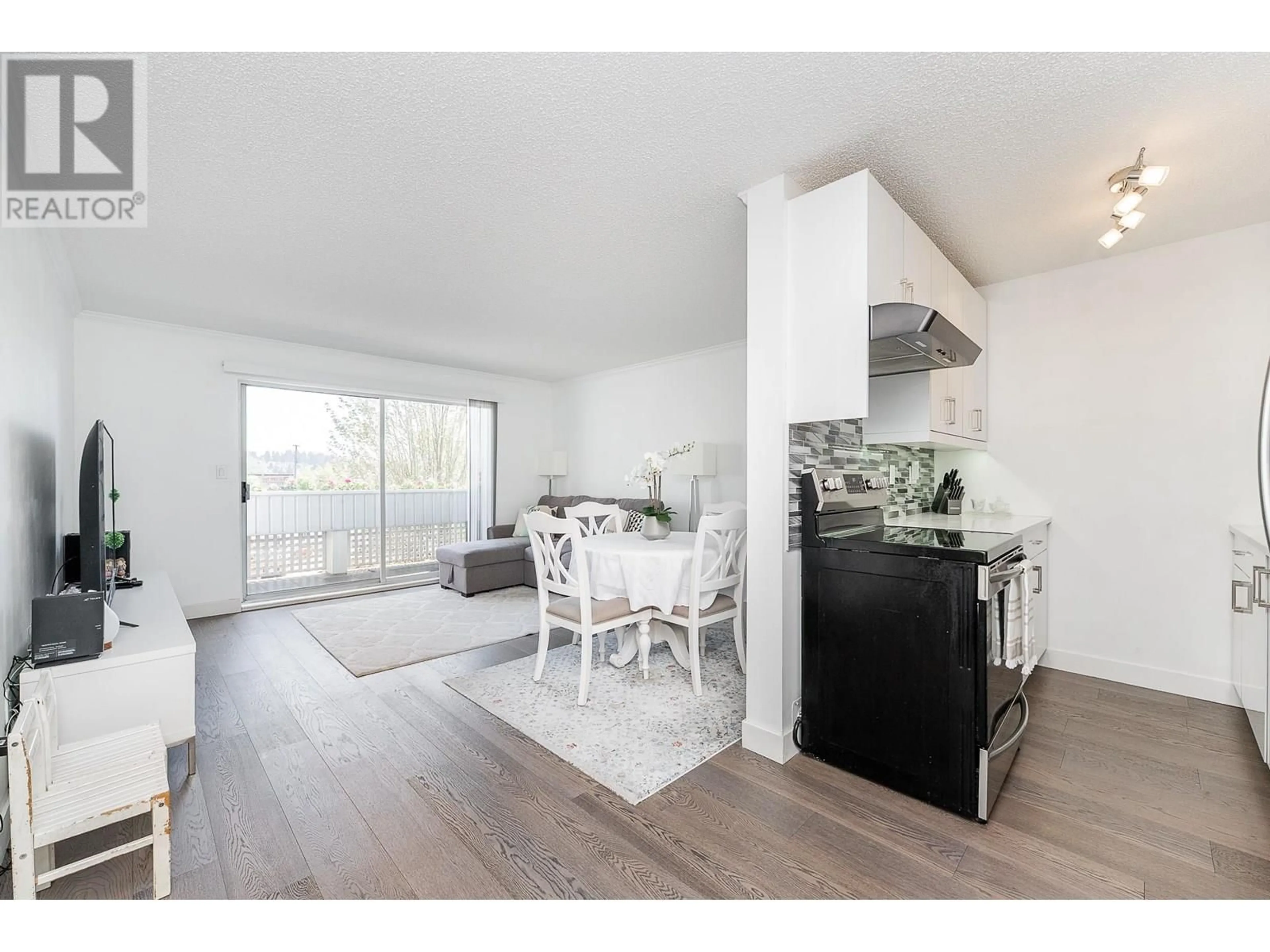 Open concept kitchen, wood/laminate floor for 307 - 2055 SUFFOLK AVENUE, Port Coquitlam British Columbia V3B1H4