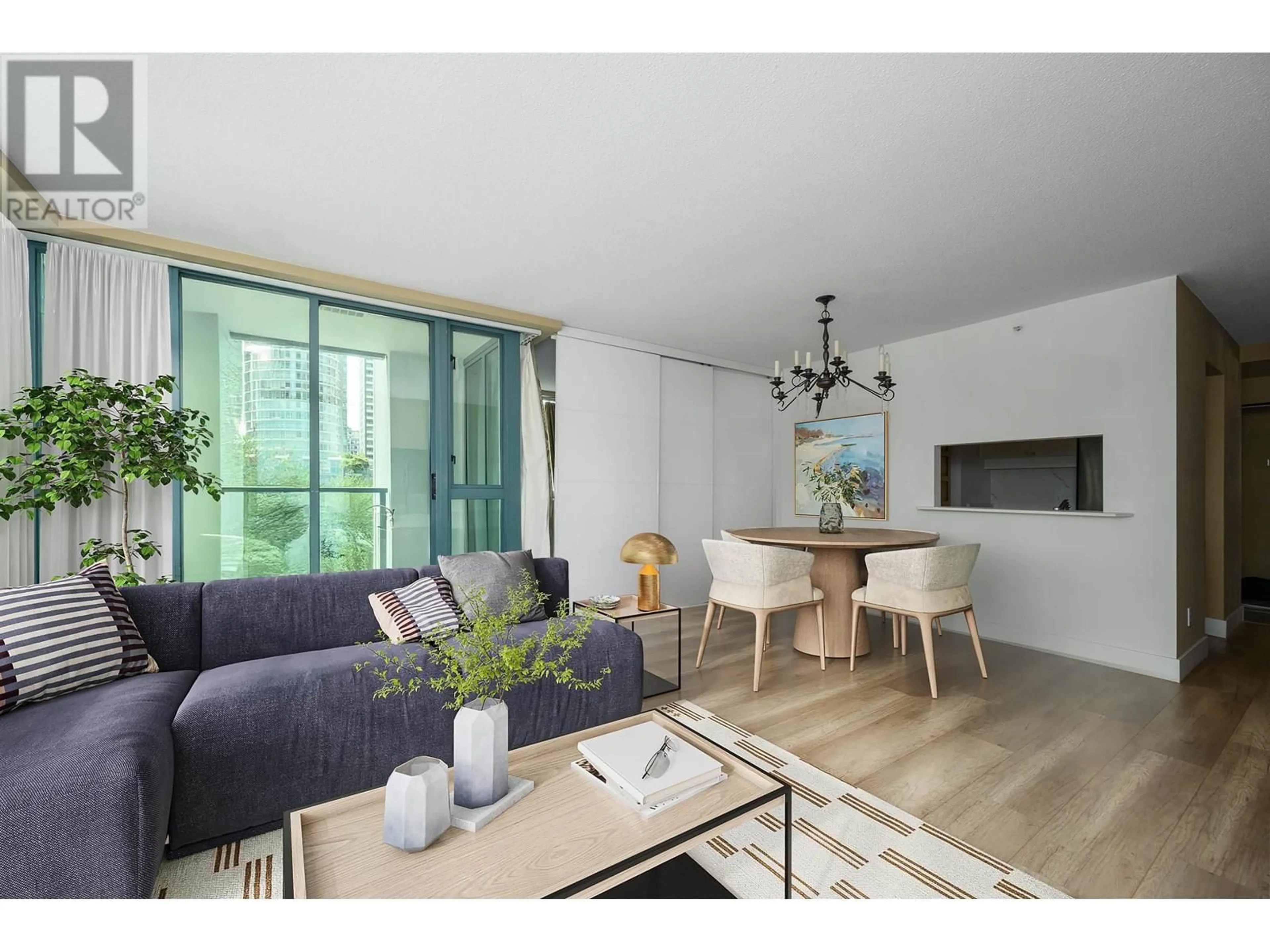 Living room with furniture, wood/laminate floor for 806 - 1238 MELVILLE STREET, Vancouver British Columbia V6E4N2