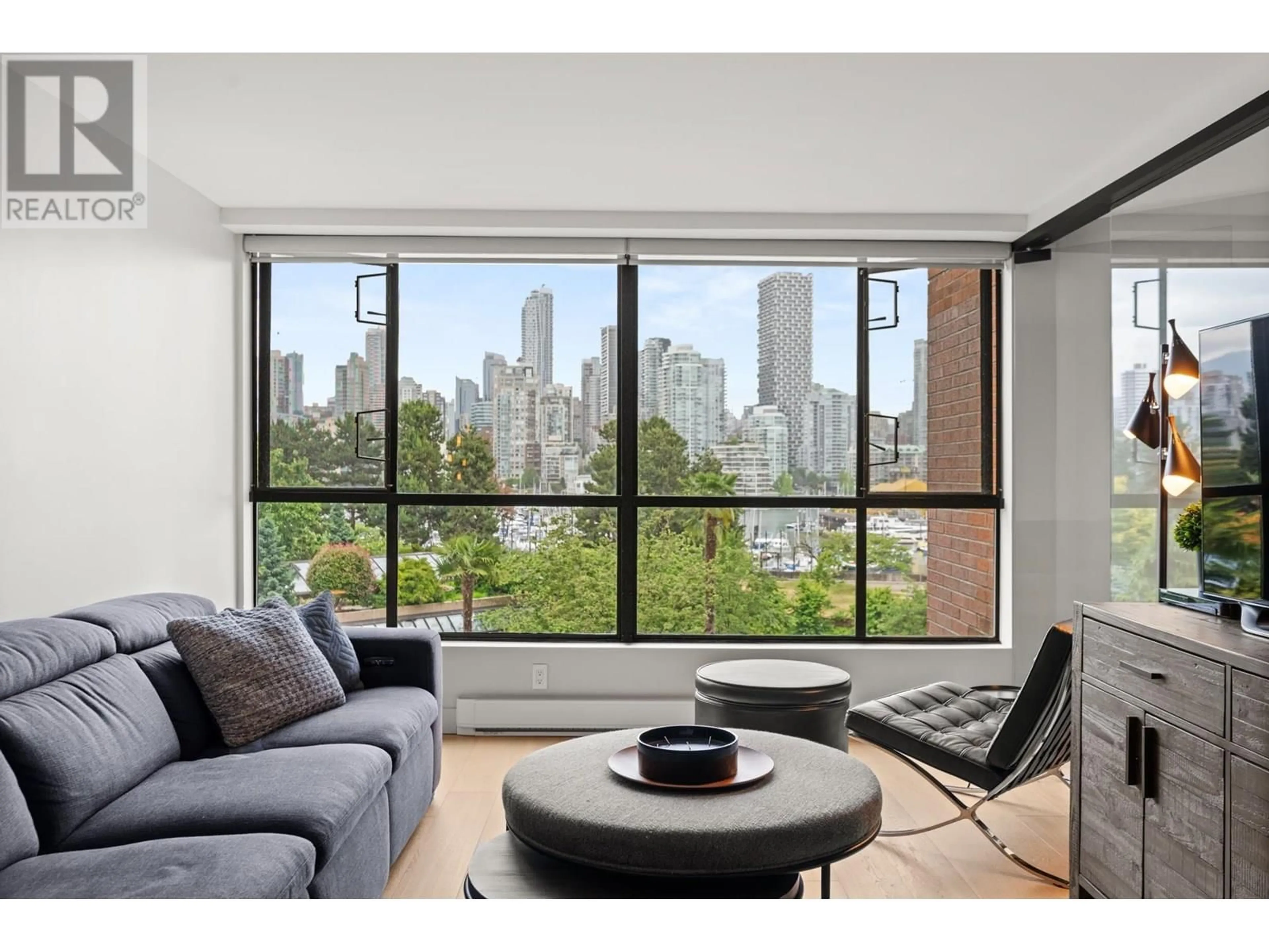 Living room with furniture, unknown for 309 - 1490 PENNYFARTHING DRIVE, Vancouver British Columbia V6J4Z3
