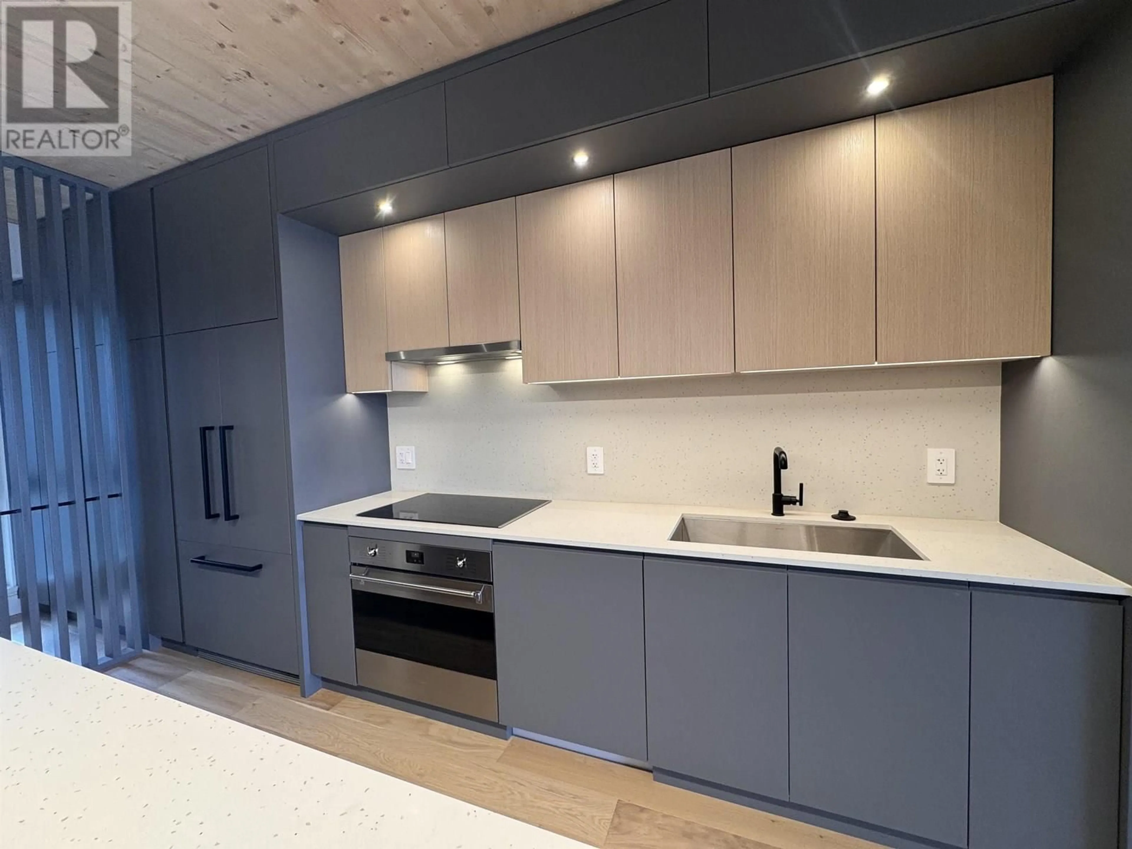 Open concept kitchen, wood/laminate floor for 208 - 310 SALTER STREET, New Westminster British Columbia V3M0N7