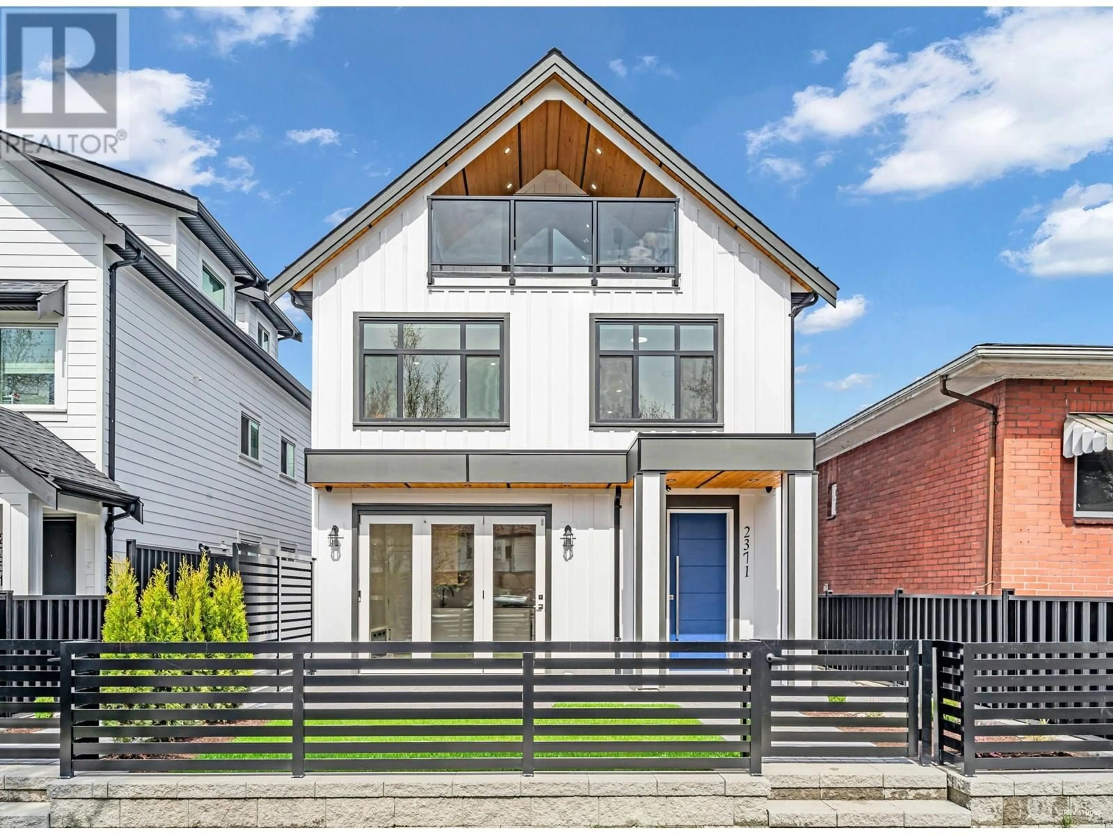 Home with brick exterior material, street for 2371 ADANAC STREET, Vancouver British Columbia V5L2E9