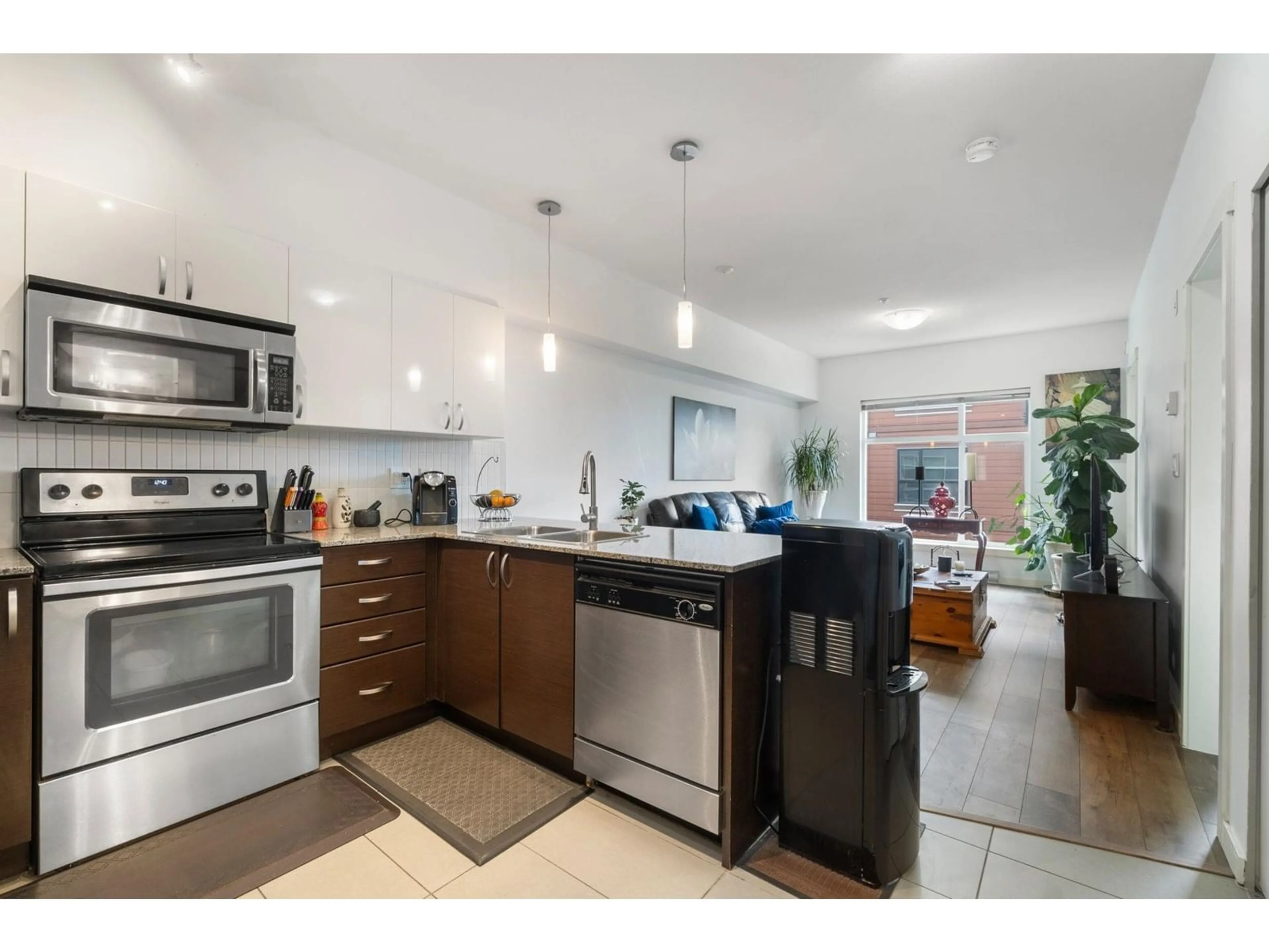 Open concept kitchen, unknown for 322 - 13728 108, Surrey British Columbia V3T0G2