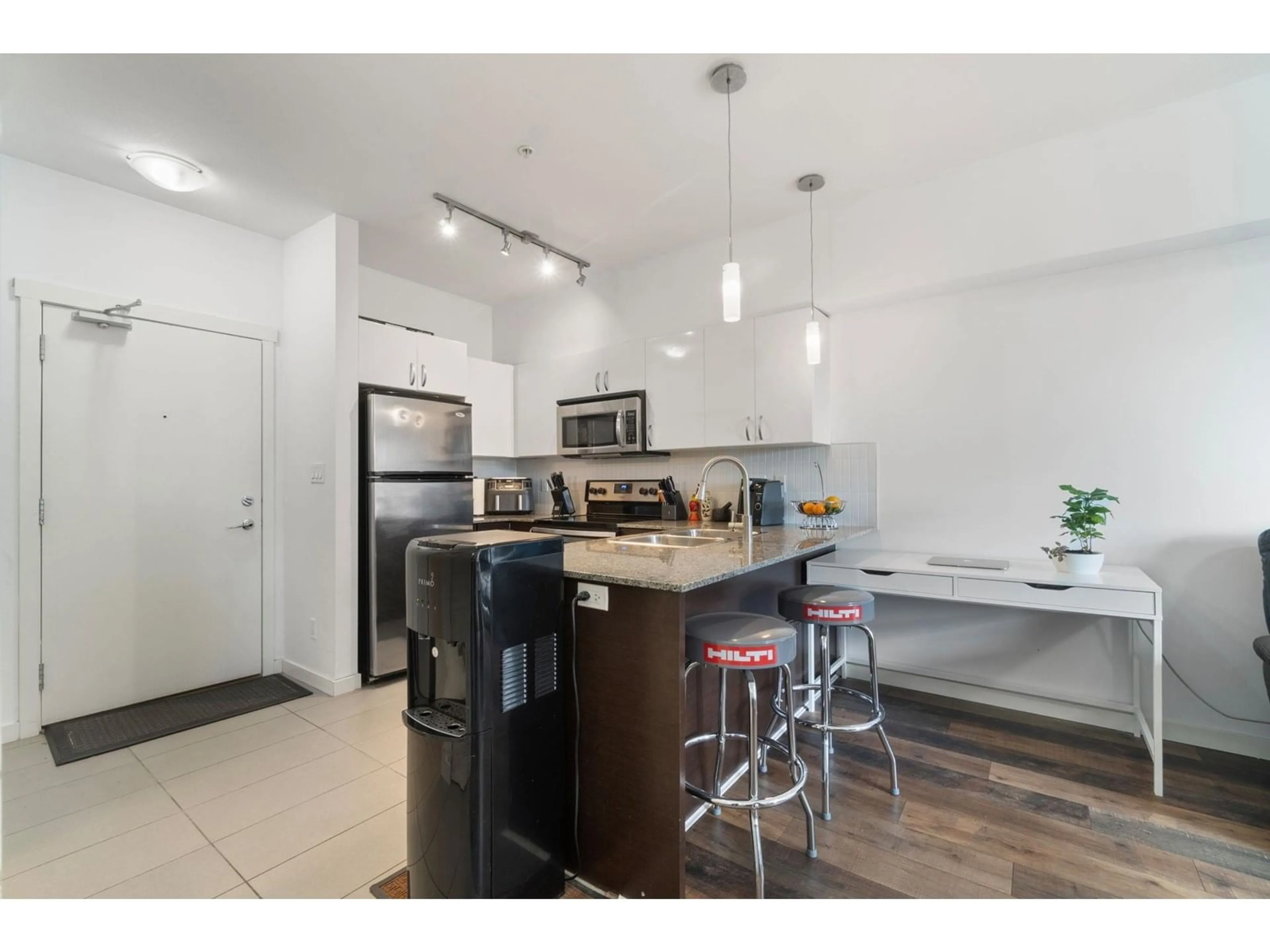 Open concept kitchen, unknown for 322 - 13728 108, Surrey British Columbia V3T0G2