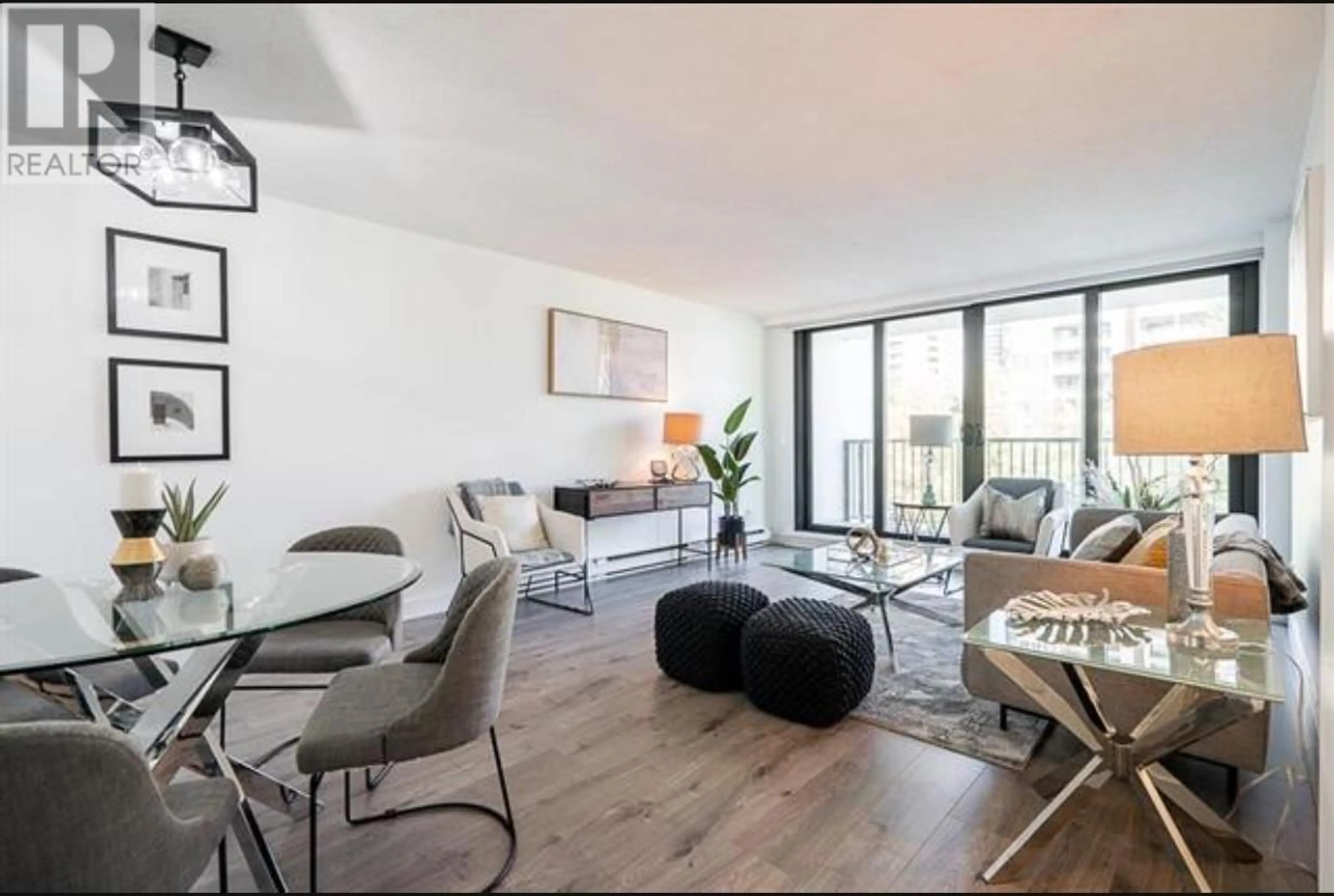 Living room with furniture, wood/laminate floor for 503 - 6455 WILLINGDON AVENUE, Burnaby British Columbia V5H4E4
