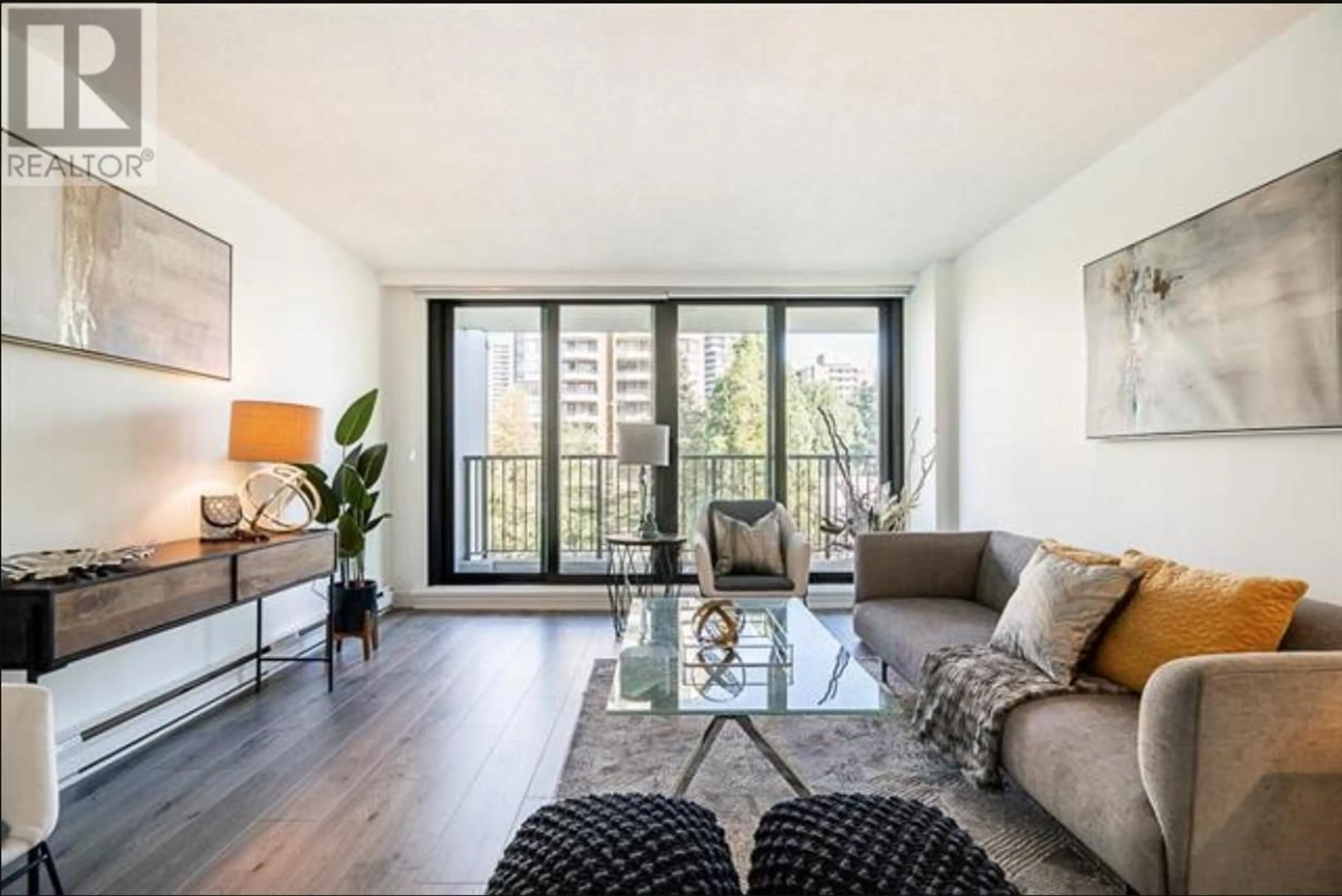 Living room with furniture, wood/laminate floor for 503 - 6455 WILLINGDON AVENUE, Burnaby British Columbia V5H4E4