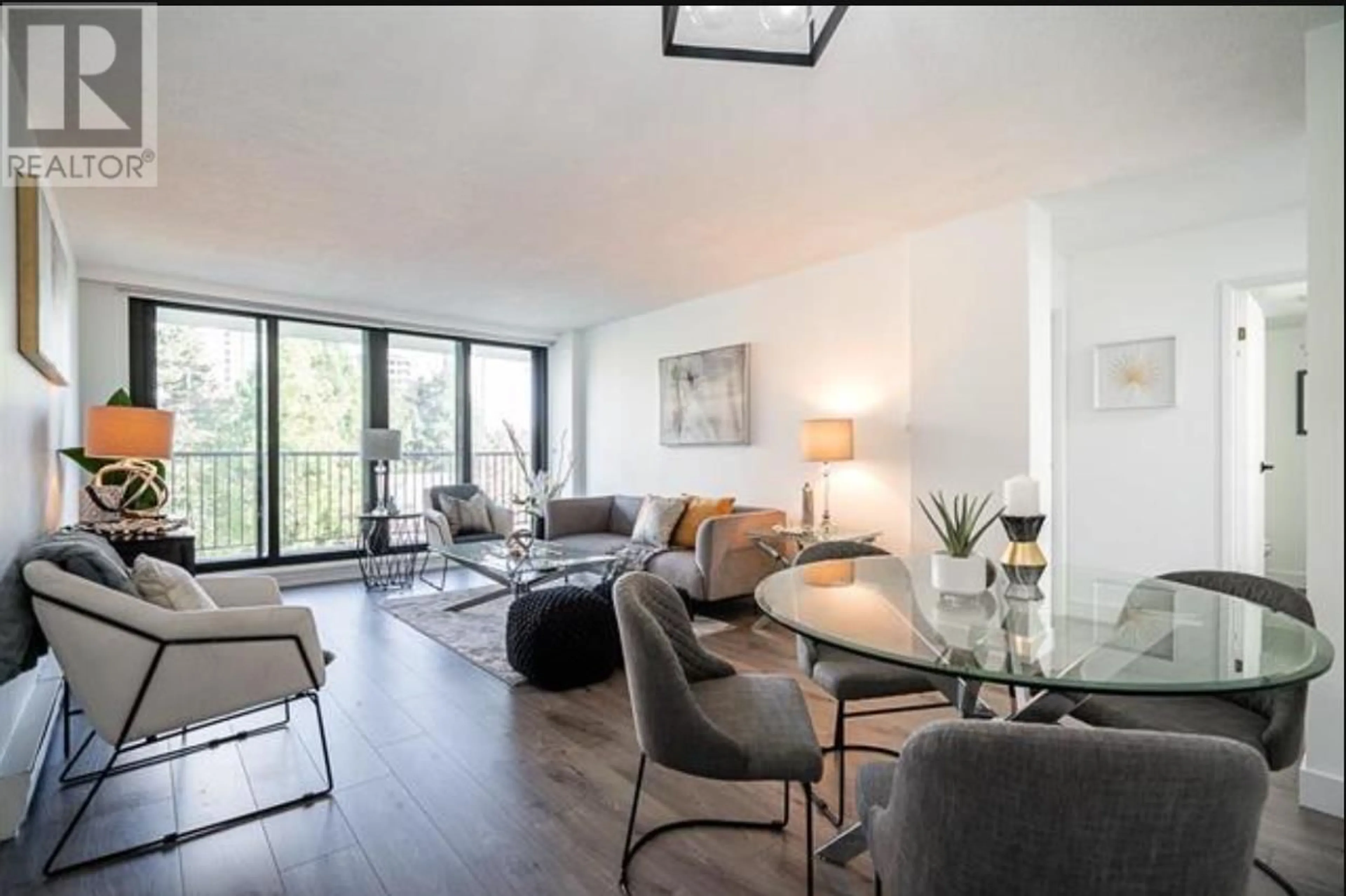 Living room with furniture, wood/laminate floor for 503 - 6455 WILLINGDON AVENUE, Burnaby British Columbia V5H4E4