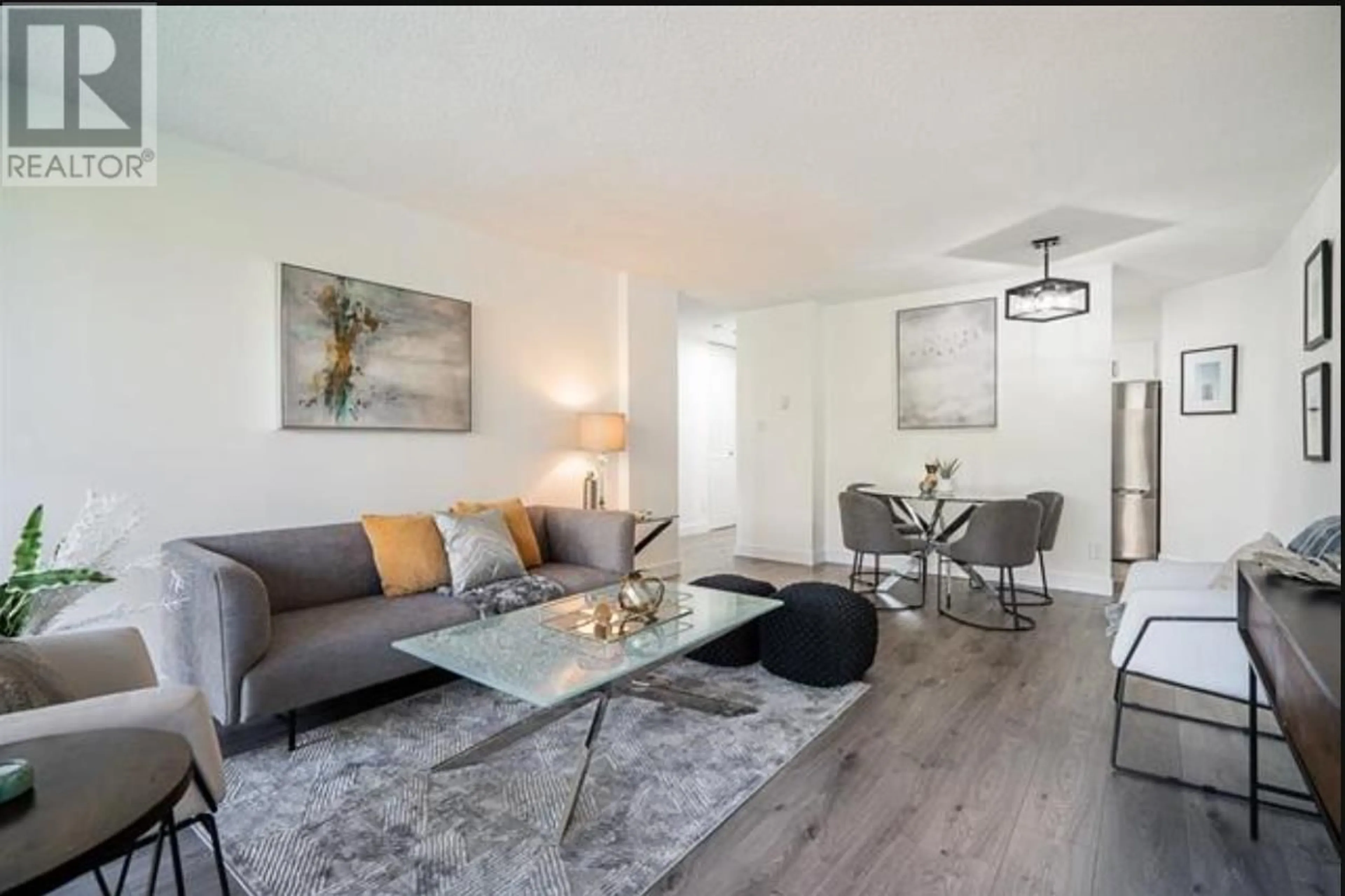Living room with furniture, wood/laminate floor for 503 - 6455 WILLINGDON AVENUE, Burnaby British Columbia V5H4E4