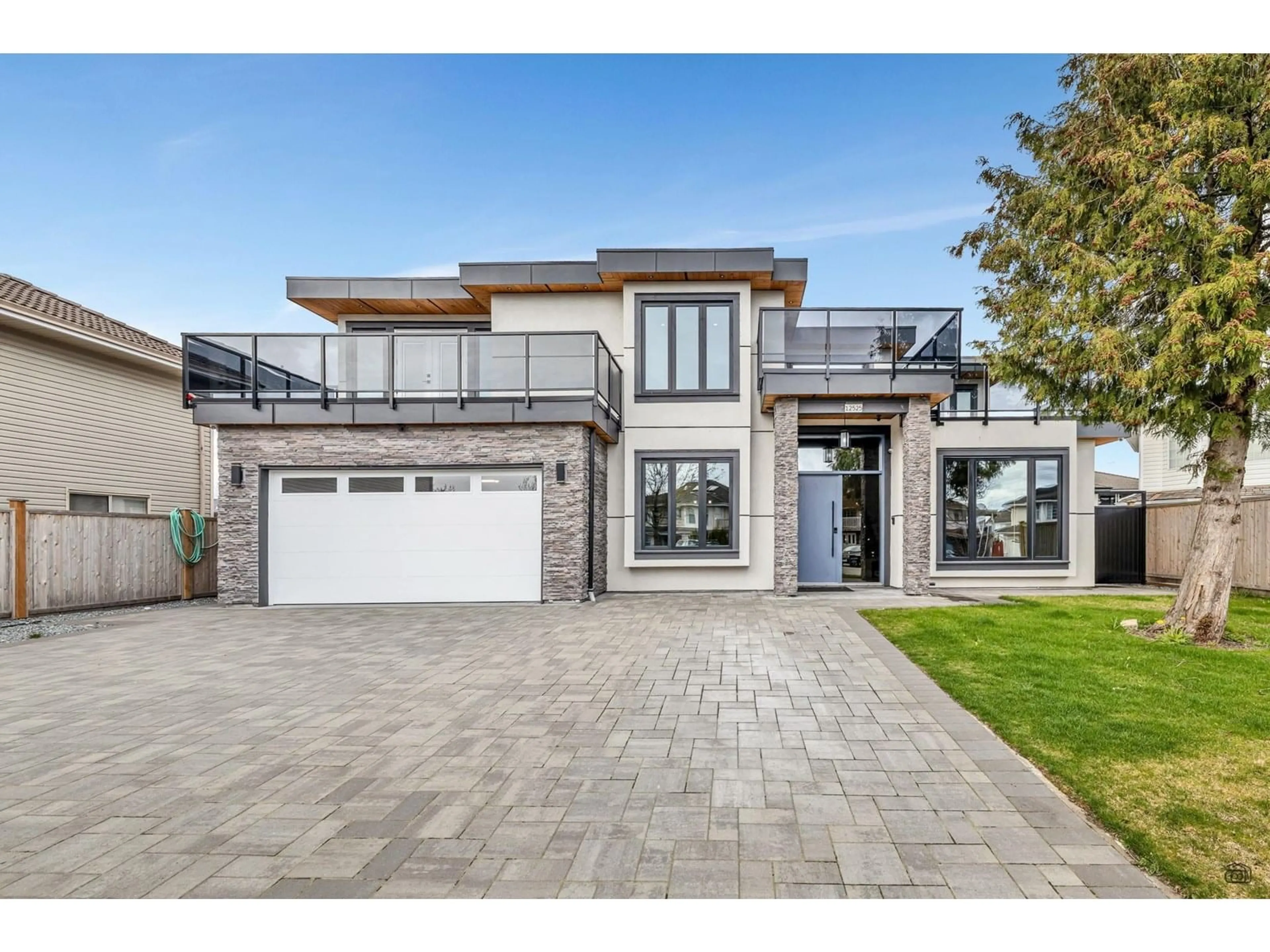 Home with brick exterior material, street for 12525 75A, Surrey British Columbia V3W0M3