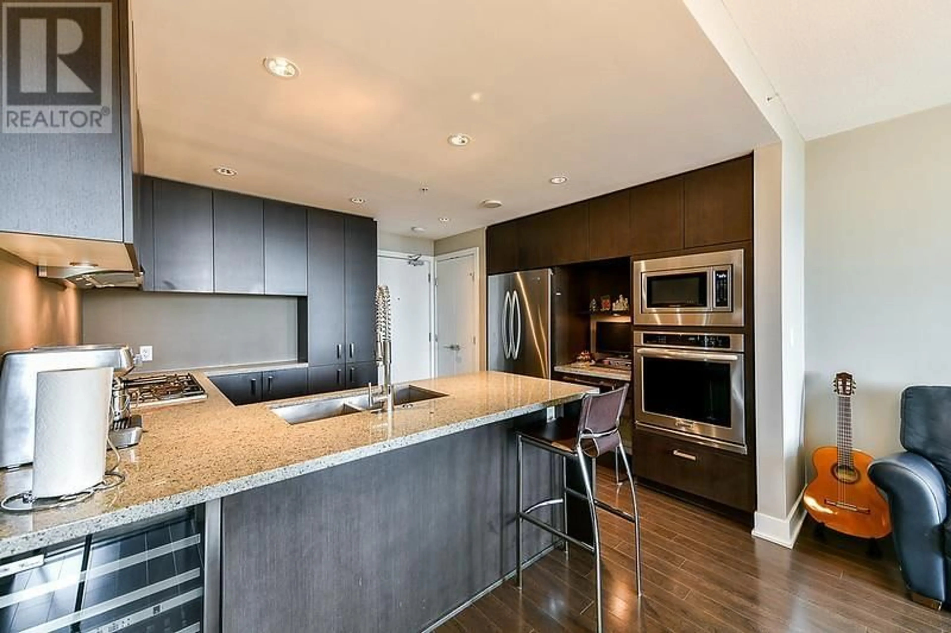 Open concept kitchen, wood/laminate floor for 2605 - 3008 GLEN DRIVE, Coquitlam British Columbia V3B0J5