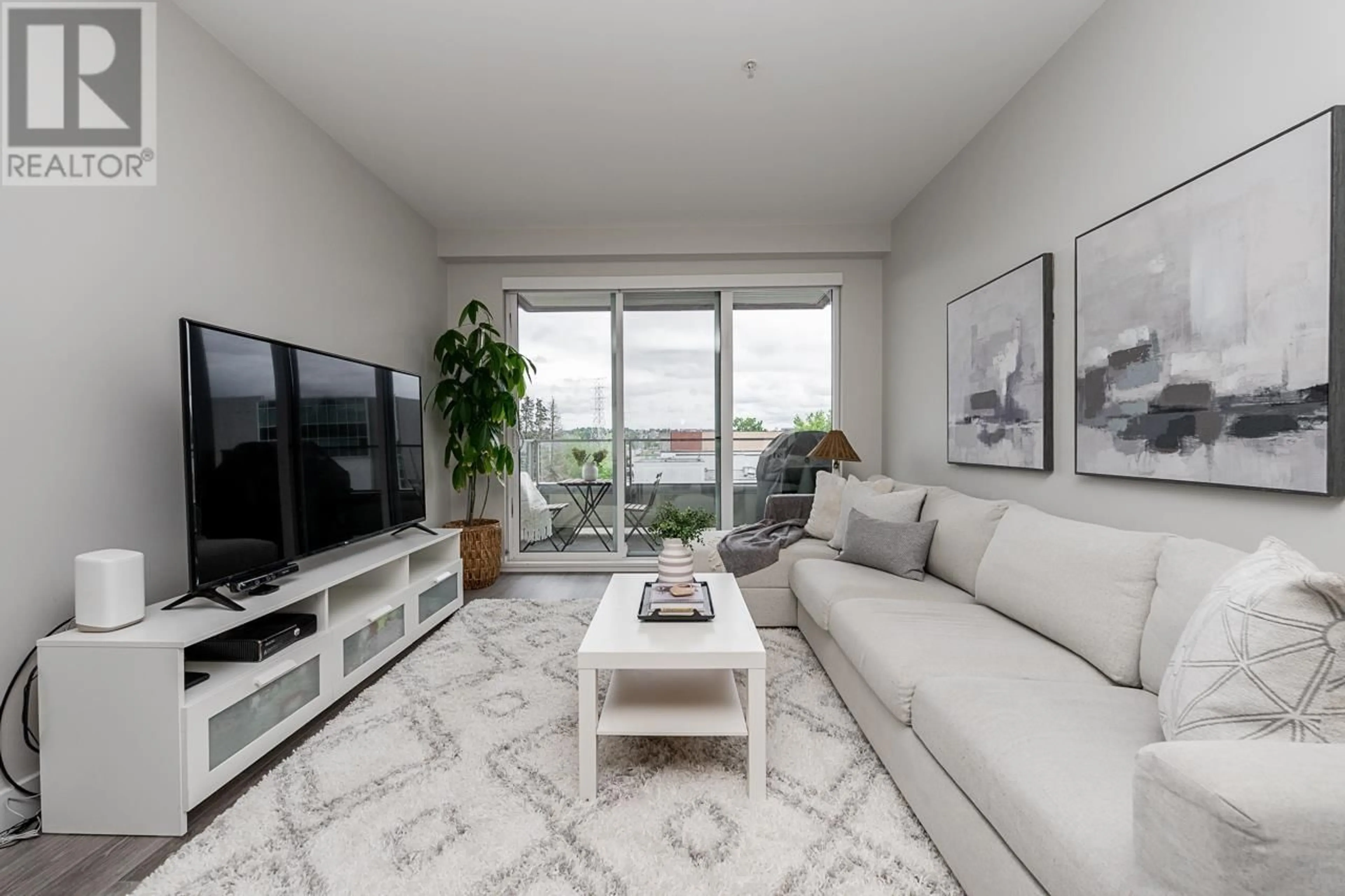 Living room with furniture, unknown for 301 - 1728 GILMORE AVENUE, Burnaby British Columbia V5C0L3