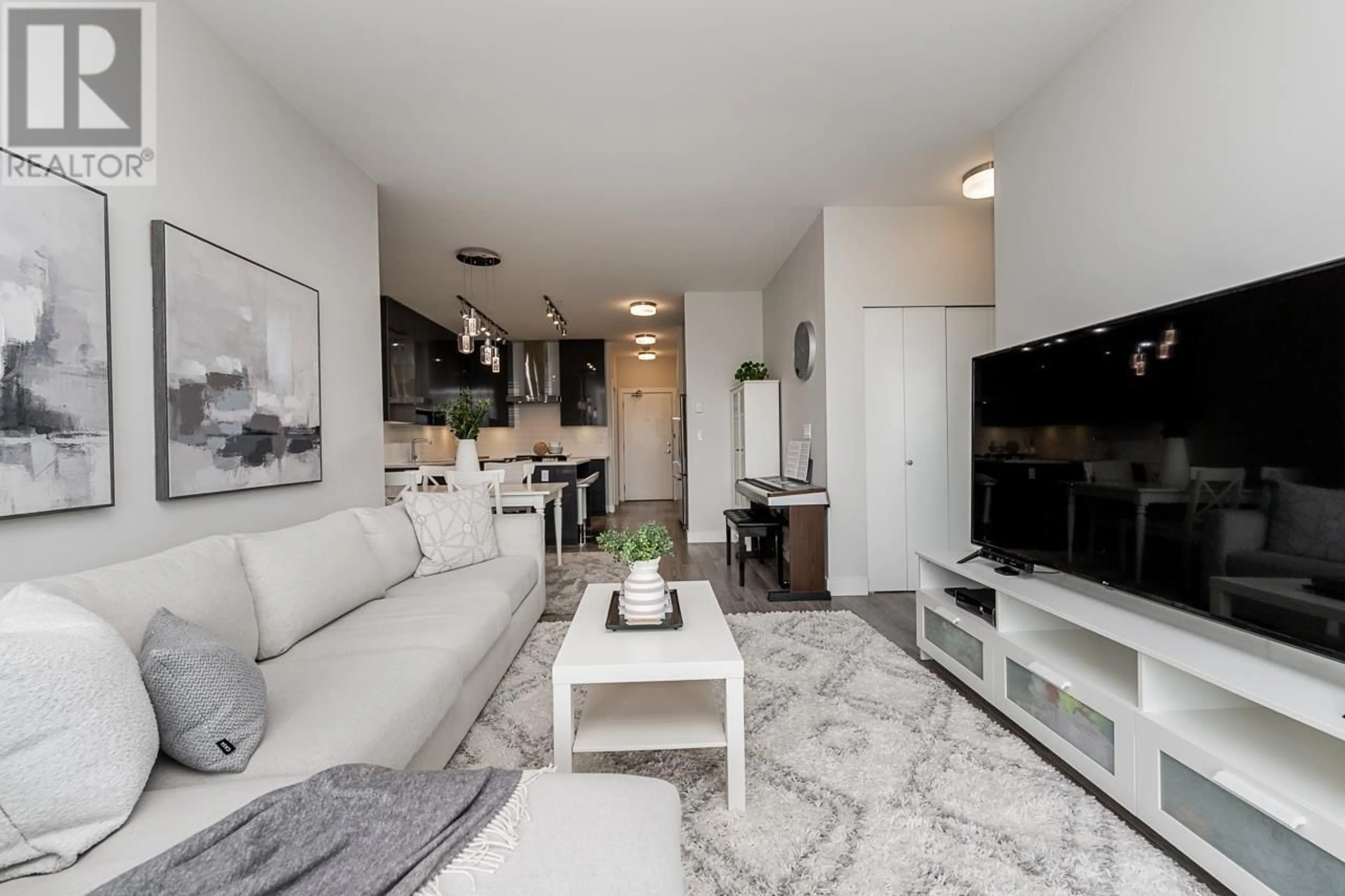 Living room with furniture, unknown for 301 - 1728 GILMORE AVENUE, Burnaby British Columbia V5C0L3