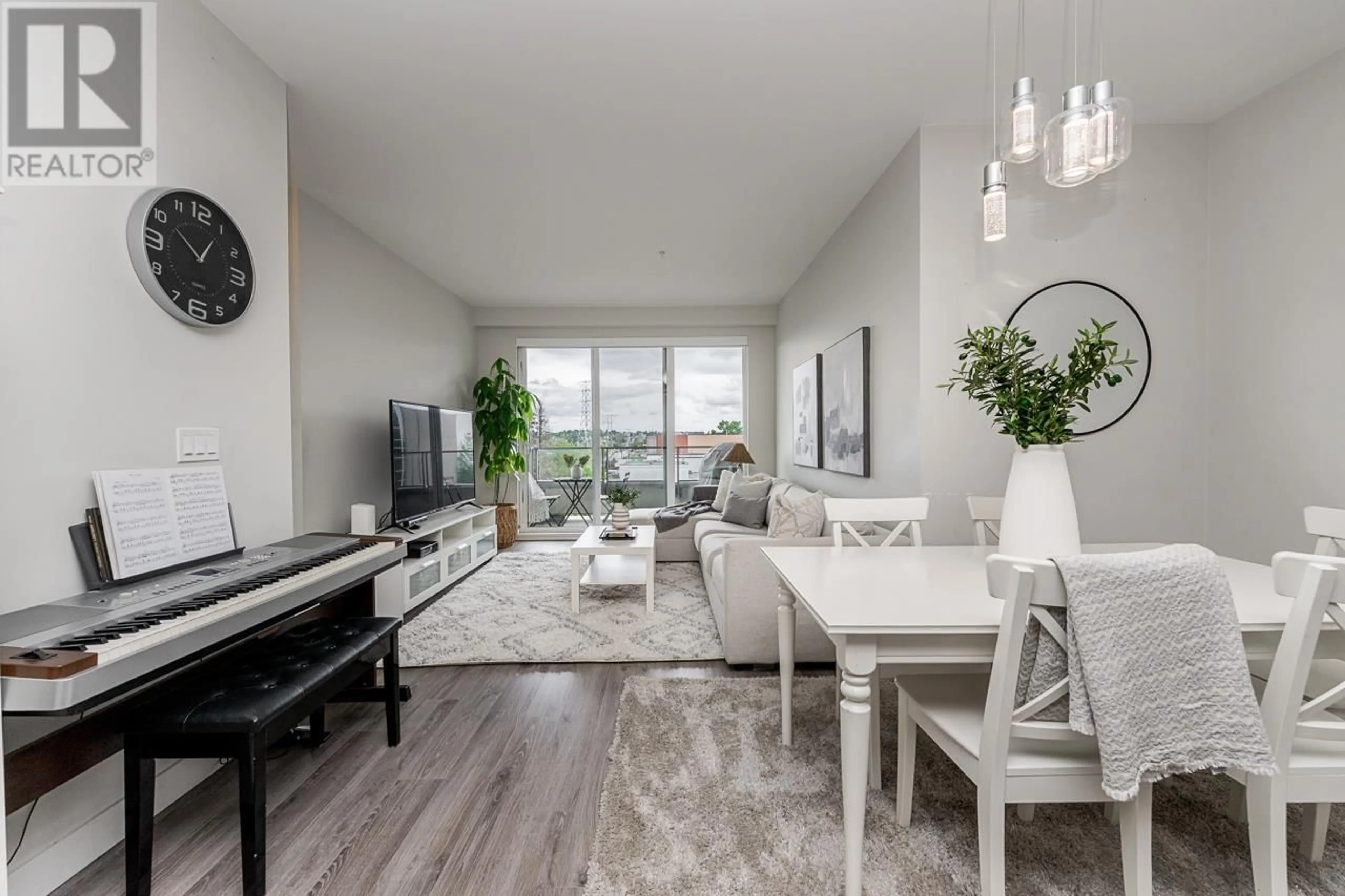 Living room with furniture, wood/laminate floor for 301 - 1728 GILMORE AVENUE, Burnaby British Columbia V5C0L3