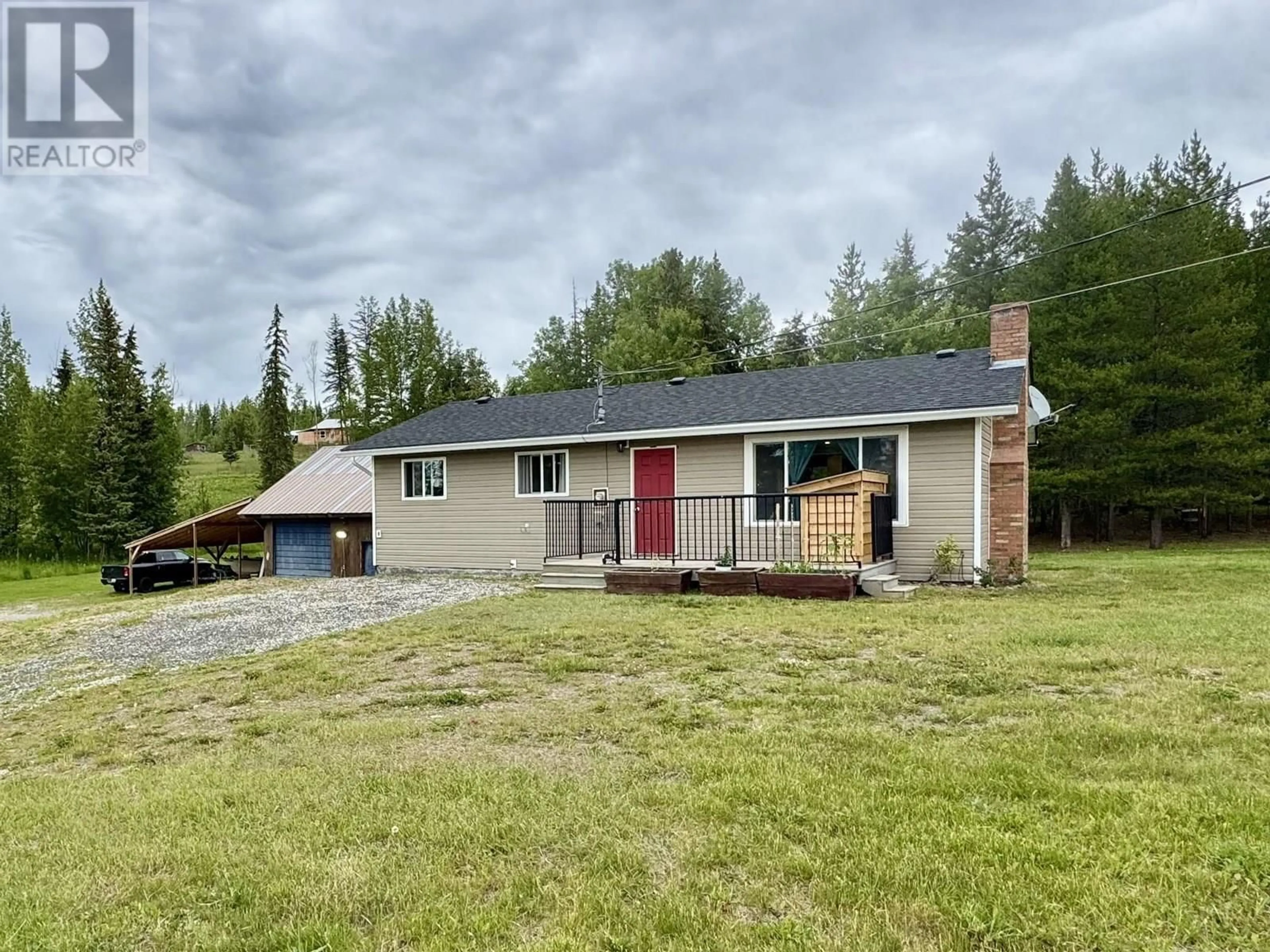 A pic from outside/outdoor area/front of a property/back of a property/a pic from drone, unknown for 3685 SPOKIN LAKE ROAD, 150 Mile House British Columbia V0K2G0