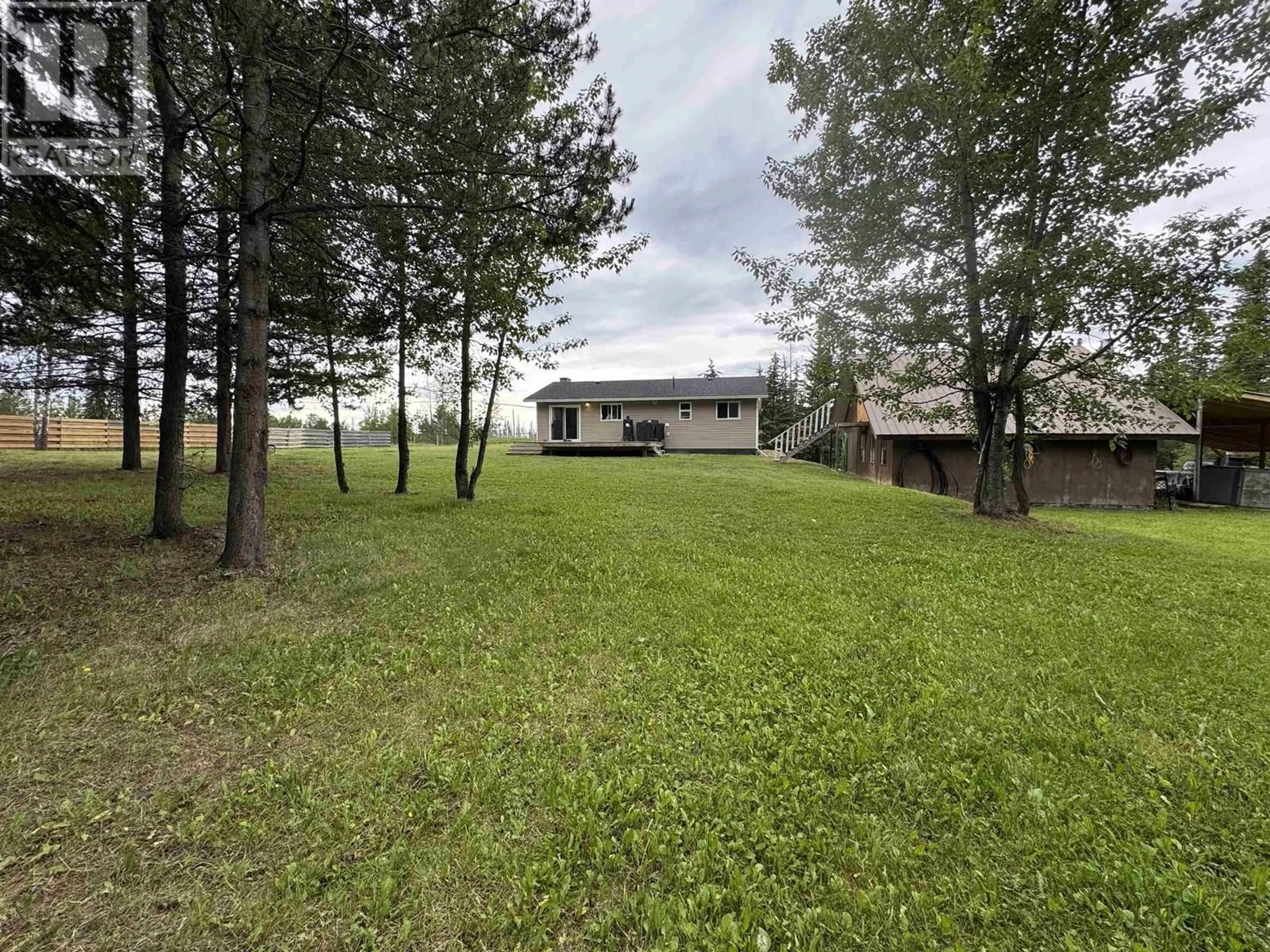 A pic from outside/outdoor area/front of a property/back of a property/a pic from drone, forest/trees view for 3685 SPOKIN LAKE ROAD, 150 Mile House British Columbia V0K2G0