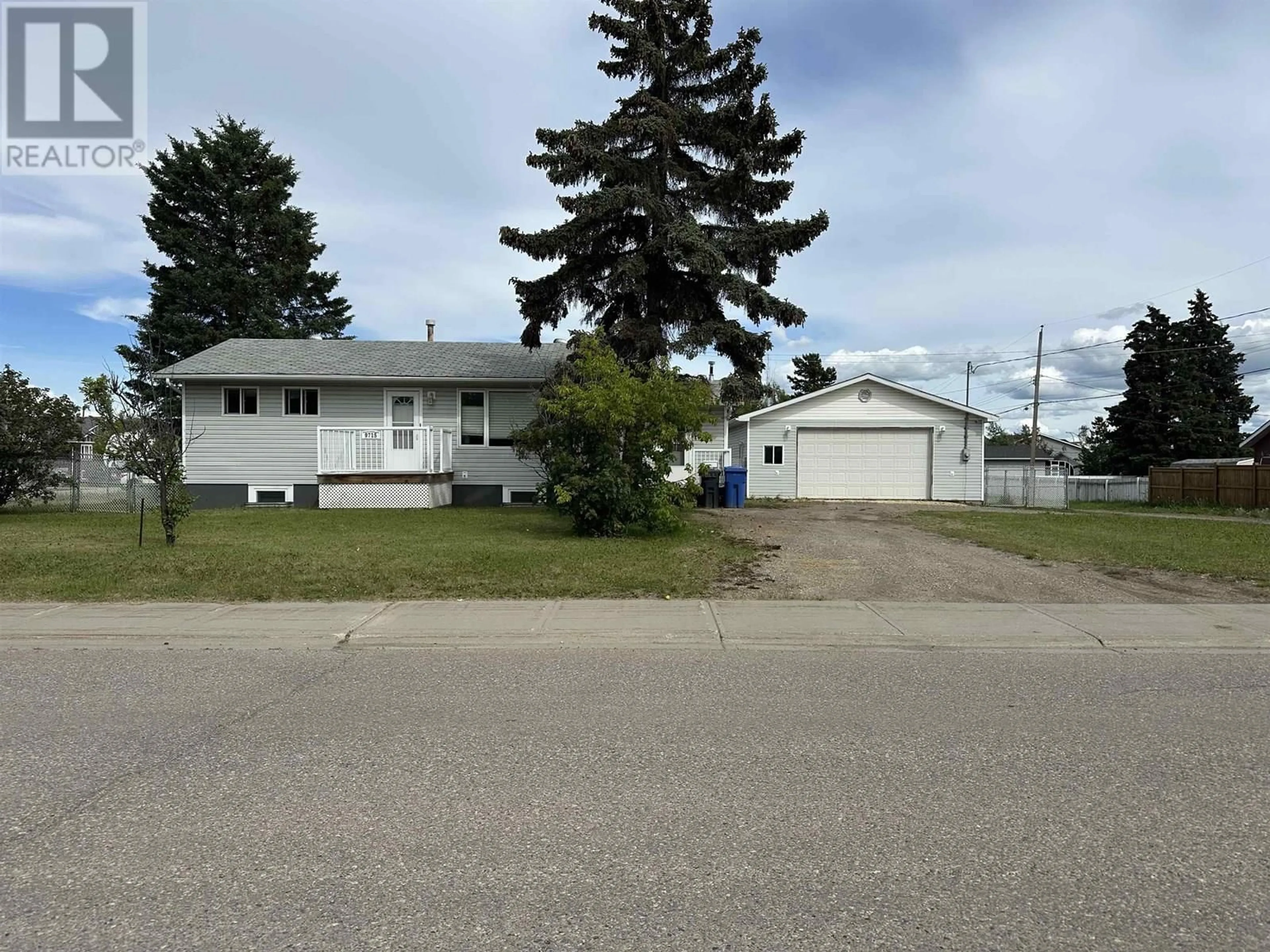 A pic from outside/outdoor area/front of a property/back of a property/a pic from drone, street for 9715 81 STREET, Fort St. John British Columbia V1J3C2
