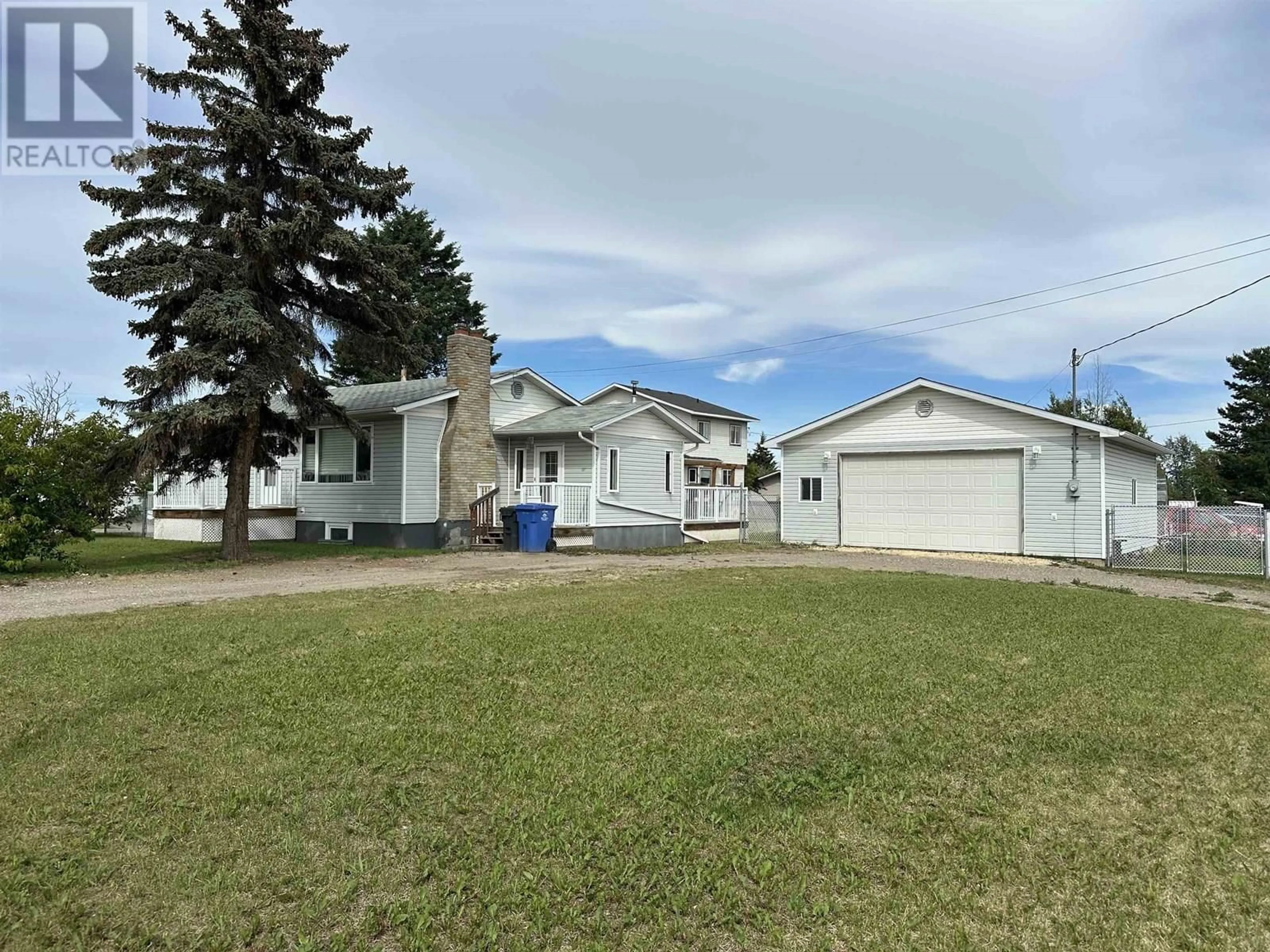 A pic from outside/outdoor area/front of a property/back of a property/a pic from drone, street for 9715 81 STREET, Fort St. John British Columbia V1J3C2