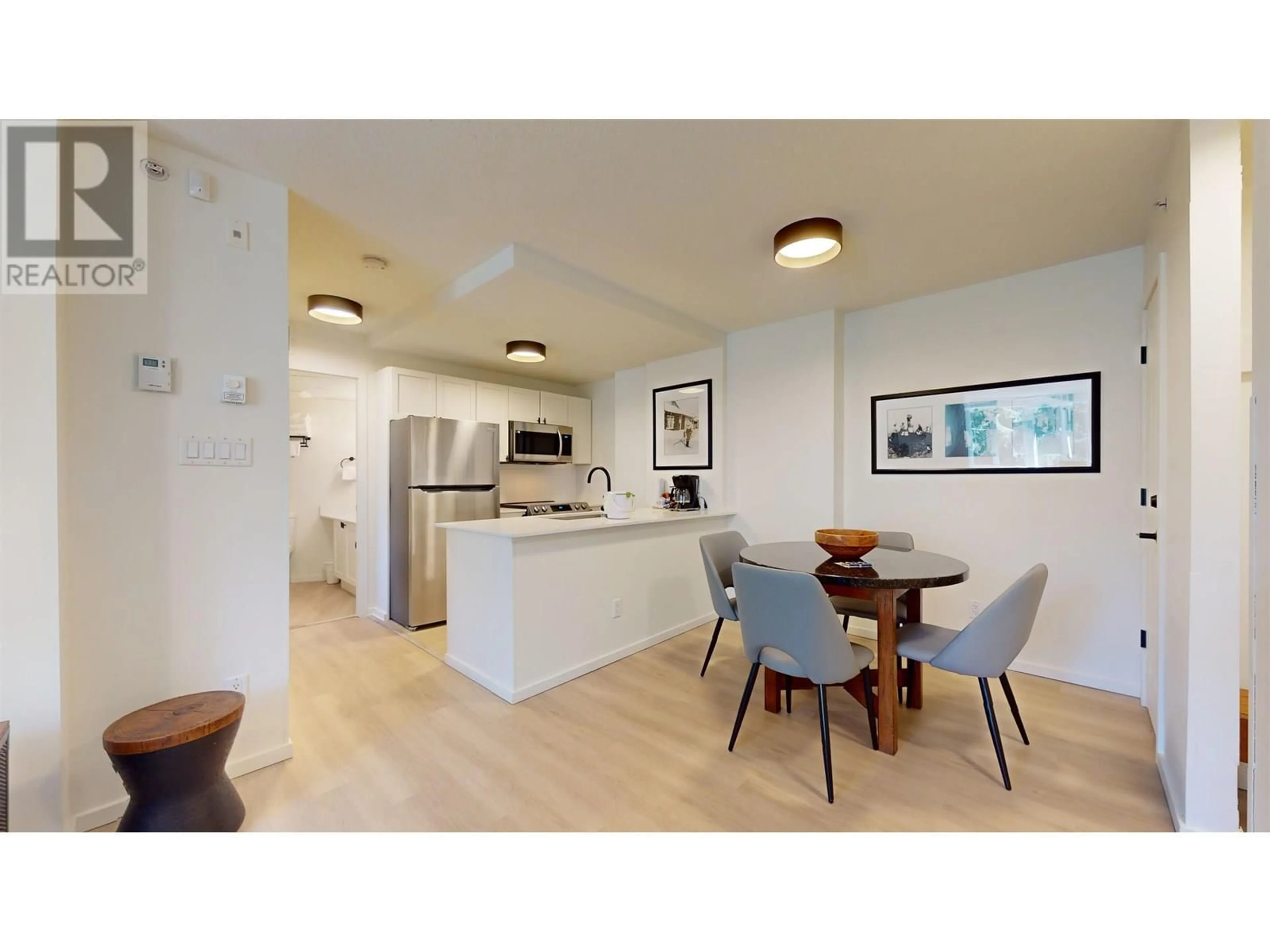 Open concept kitchen, wood/laminate floor for 615 - 4315 NORTHLANDS BOULEVARD, Whistler British Columbia V8E1C1