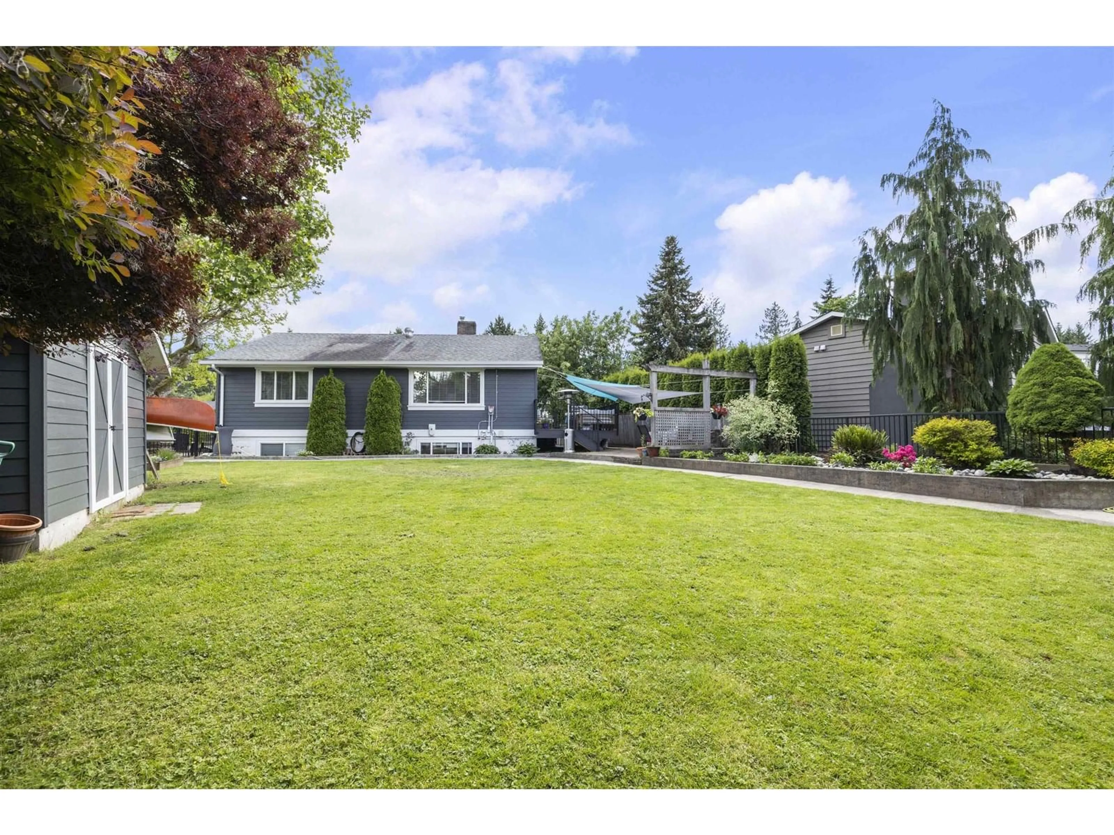 A pic from outside/outdoor area/front of a property/back of a property/a pic from drone, street for 4745 207A, Langley British Columbia V3A6W5
