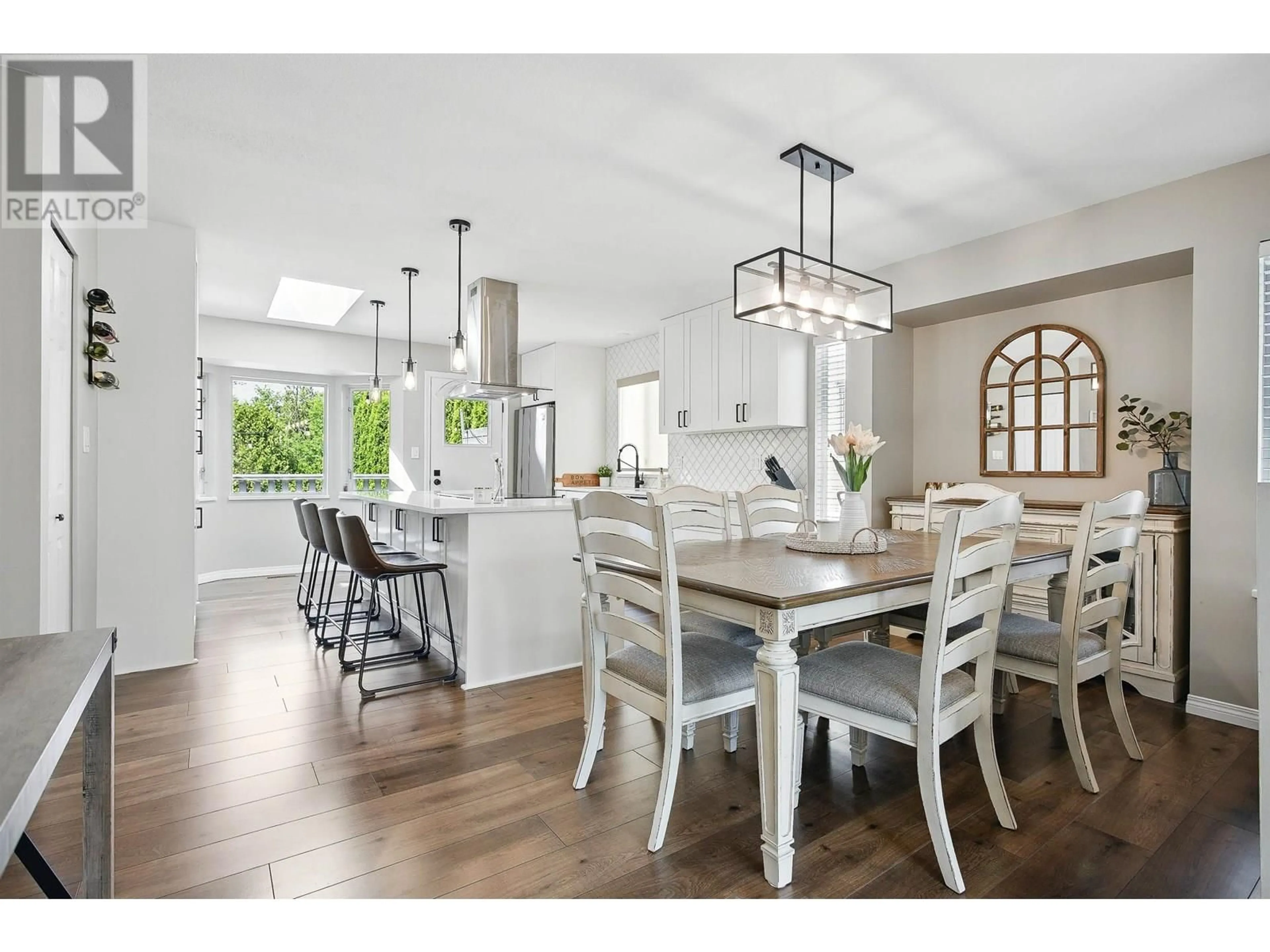 Open concept kitchen, wood/laminate floor for 22891 125A AVENUE, Maple Ridge British Columbia V2X0N3