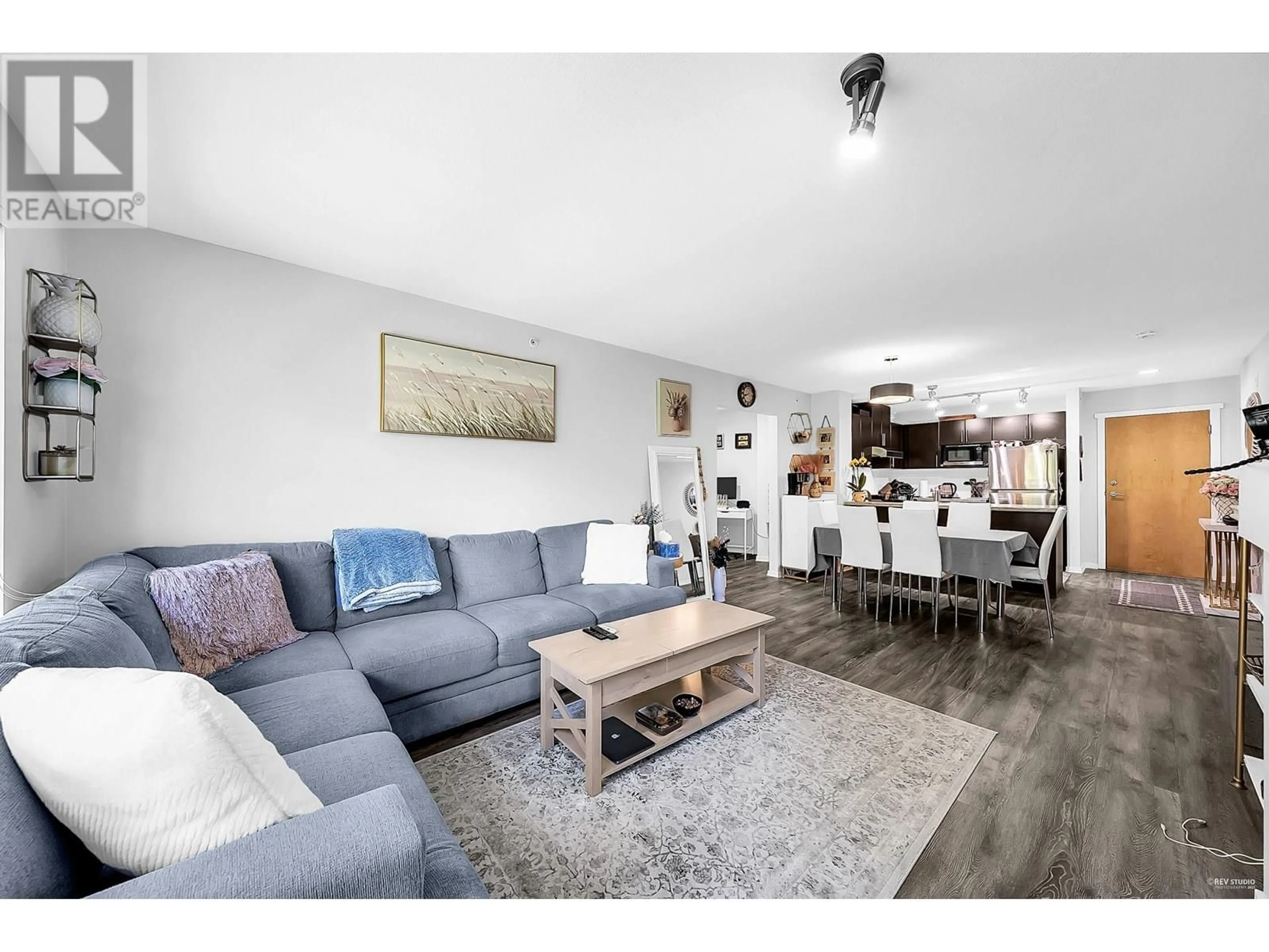 Living room with furniture, wood/laminate floor for 422 - 700 KLAHANIE DRIVE, Port Moody British Columbia V3H5L3