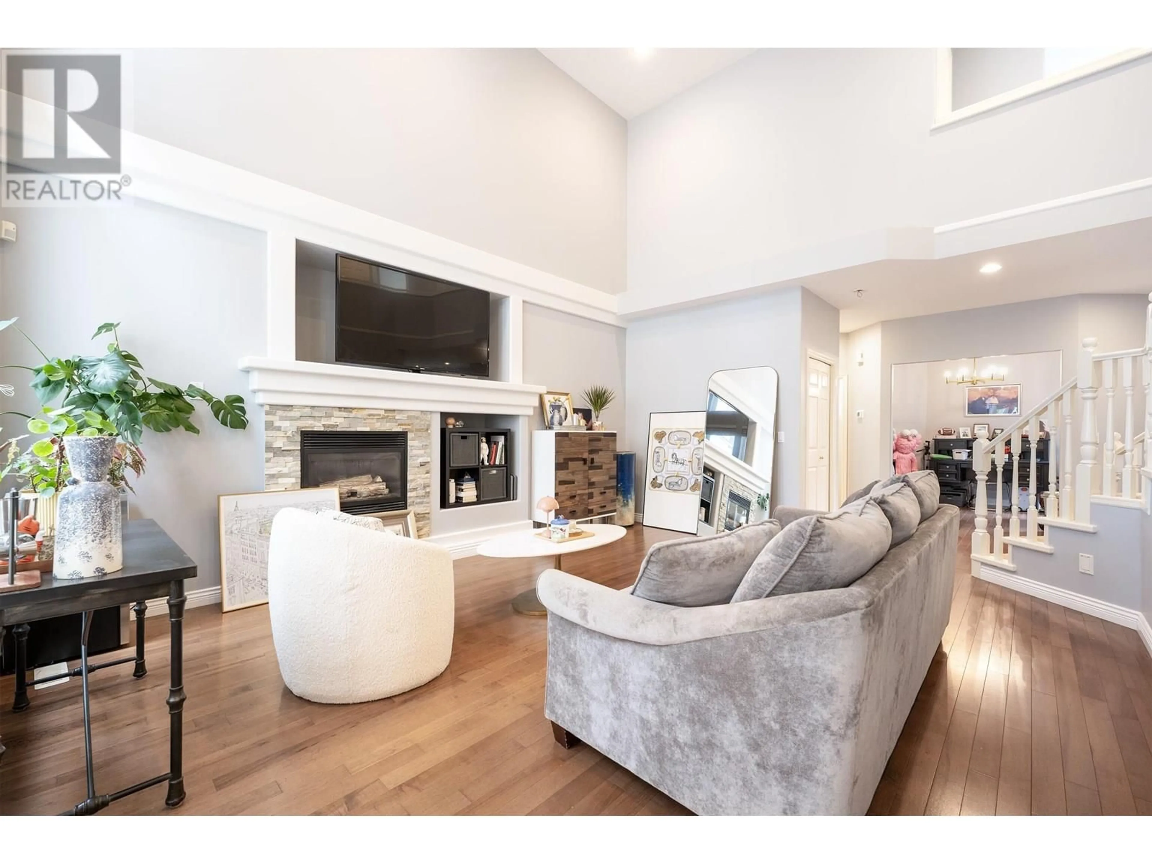 Living room with furniture, wood/laminate floor for 3271 CHARTWELL, Coquitlam British Columbia V3E3M9