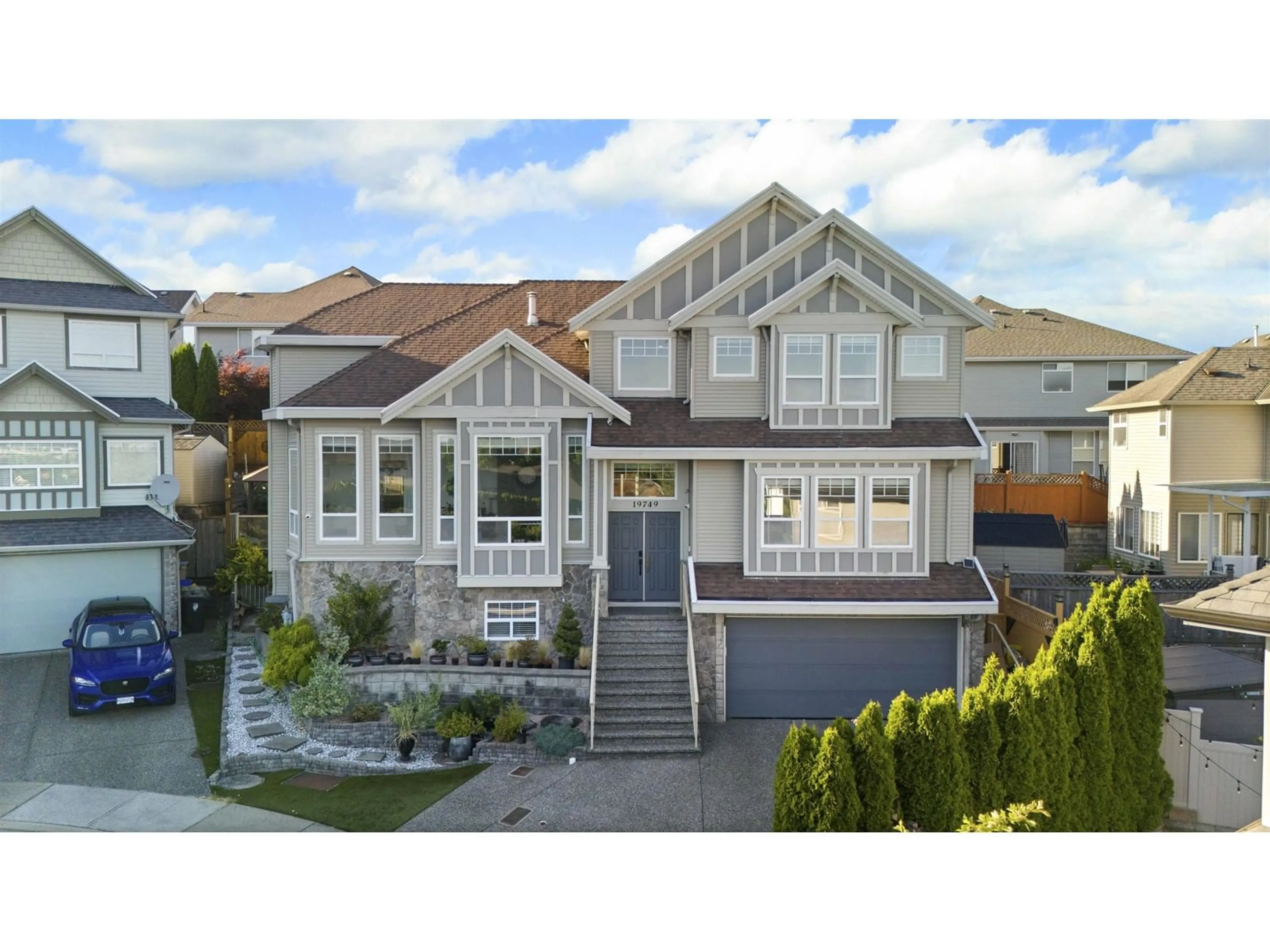 Home with vinyl exterior material, street for 19749 68B, Langley British Columbia V2Y3H4
