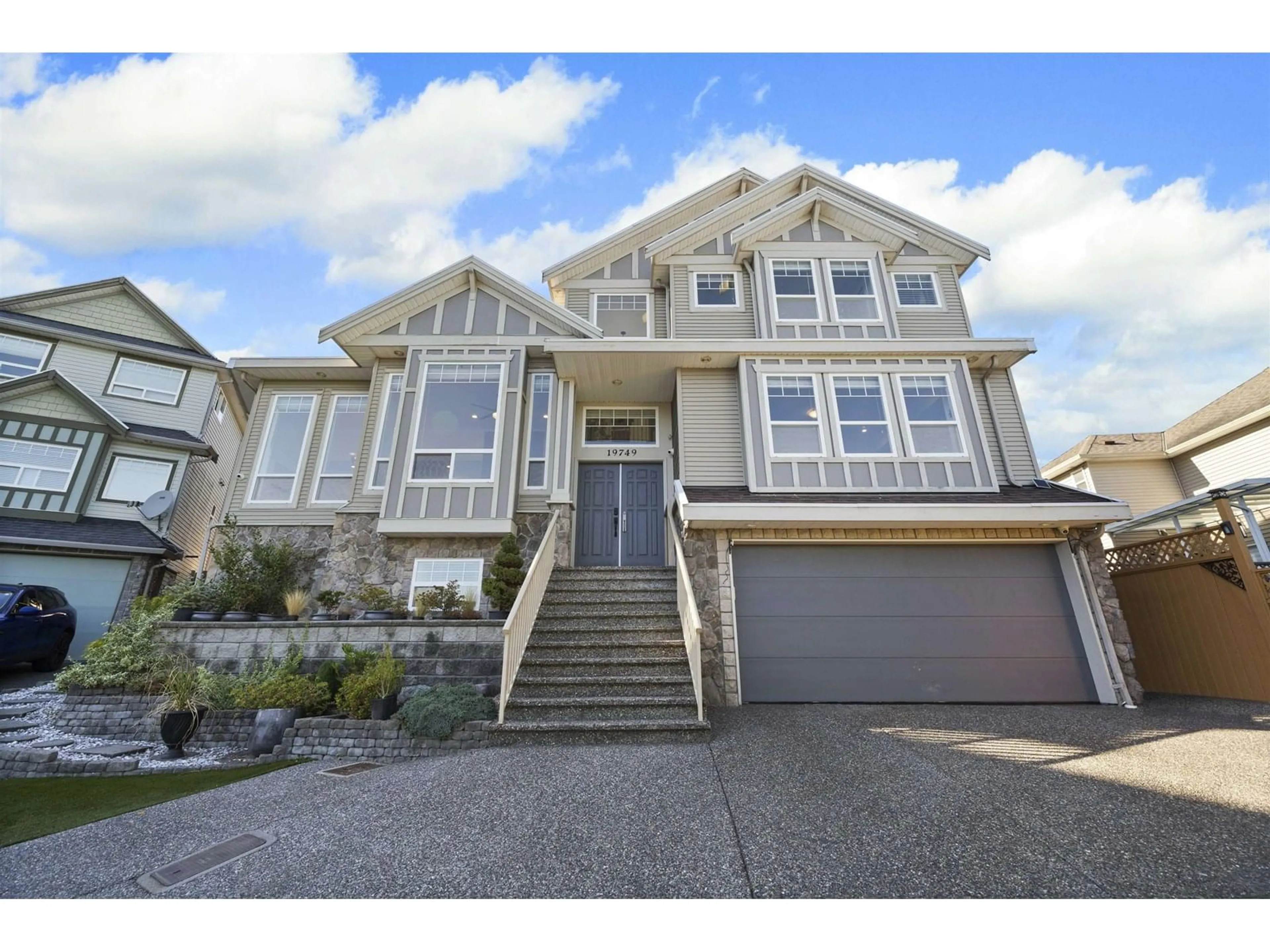 Home with vinyl exterior material, street for 19749 68B, Langley British Columbia V2Y3H4