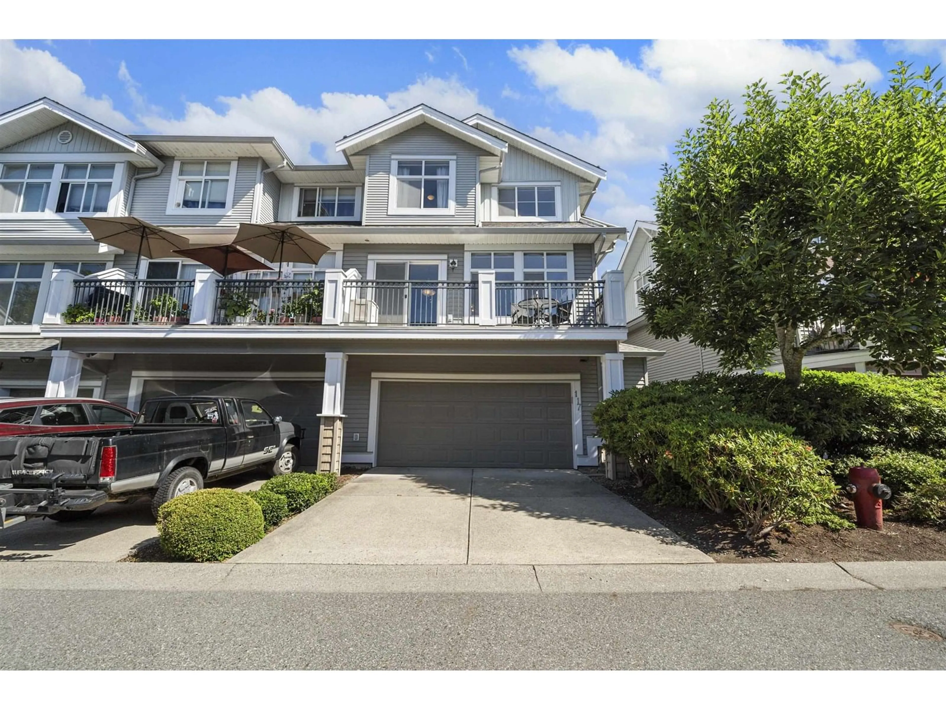 A pic from outside/outdoor area/front of a property/back of a property/a pic from drone, street for 117 - 20449 66, Langley British Columbia V2Y3C1