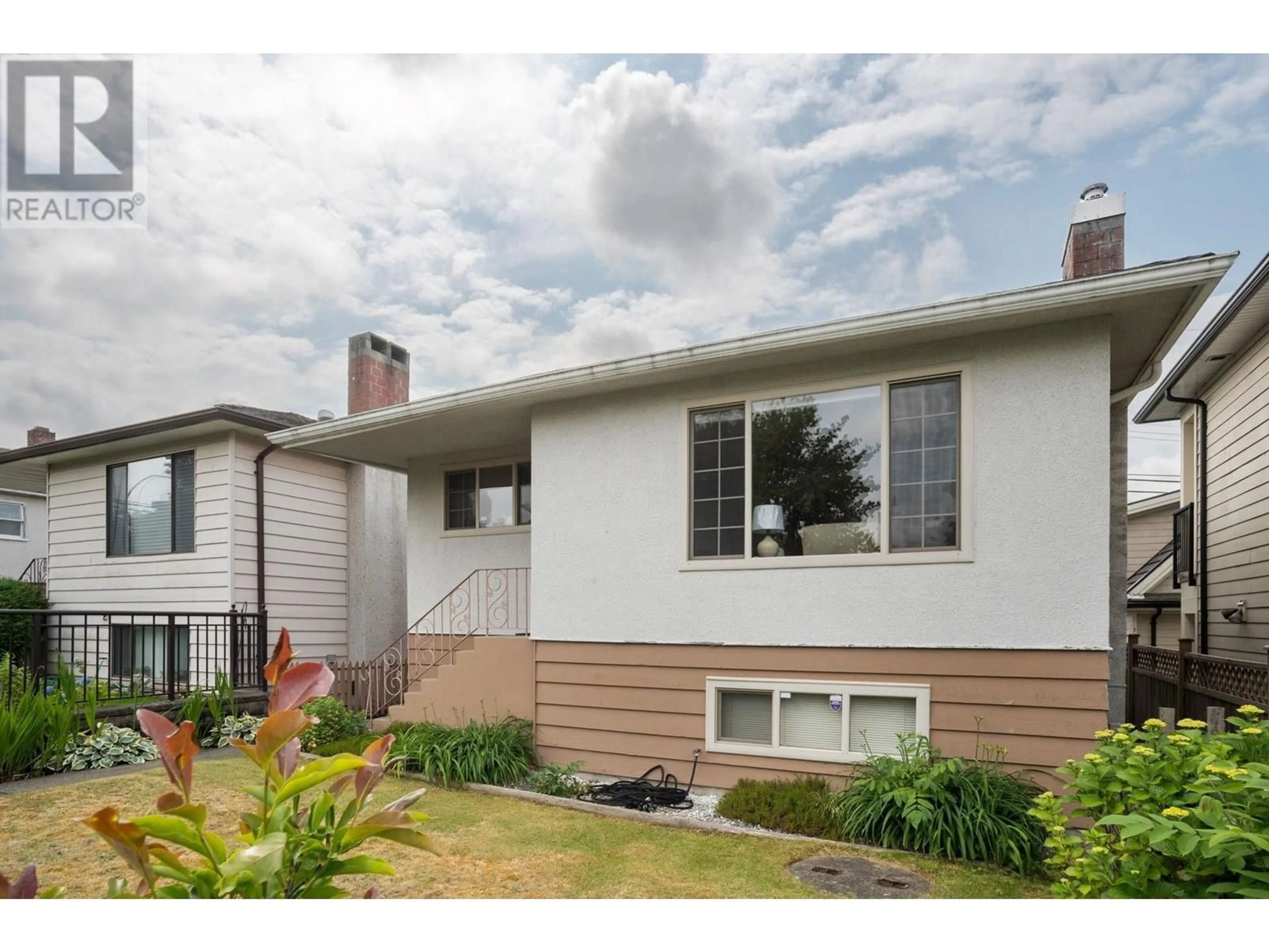 Home with vinyl exterior material, street for 3260 48 AVENUE, Vancouver British Columbia V5S1H5