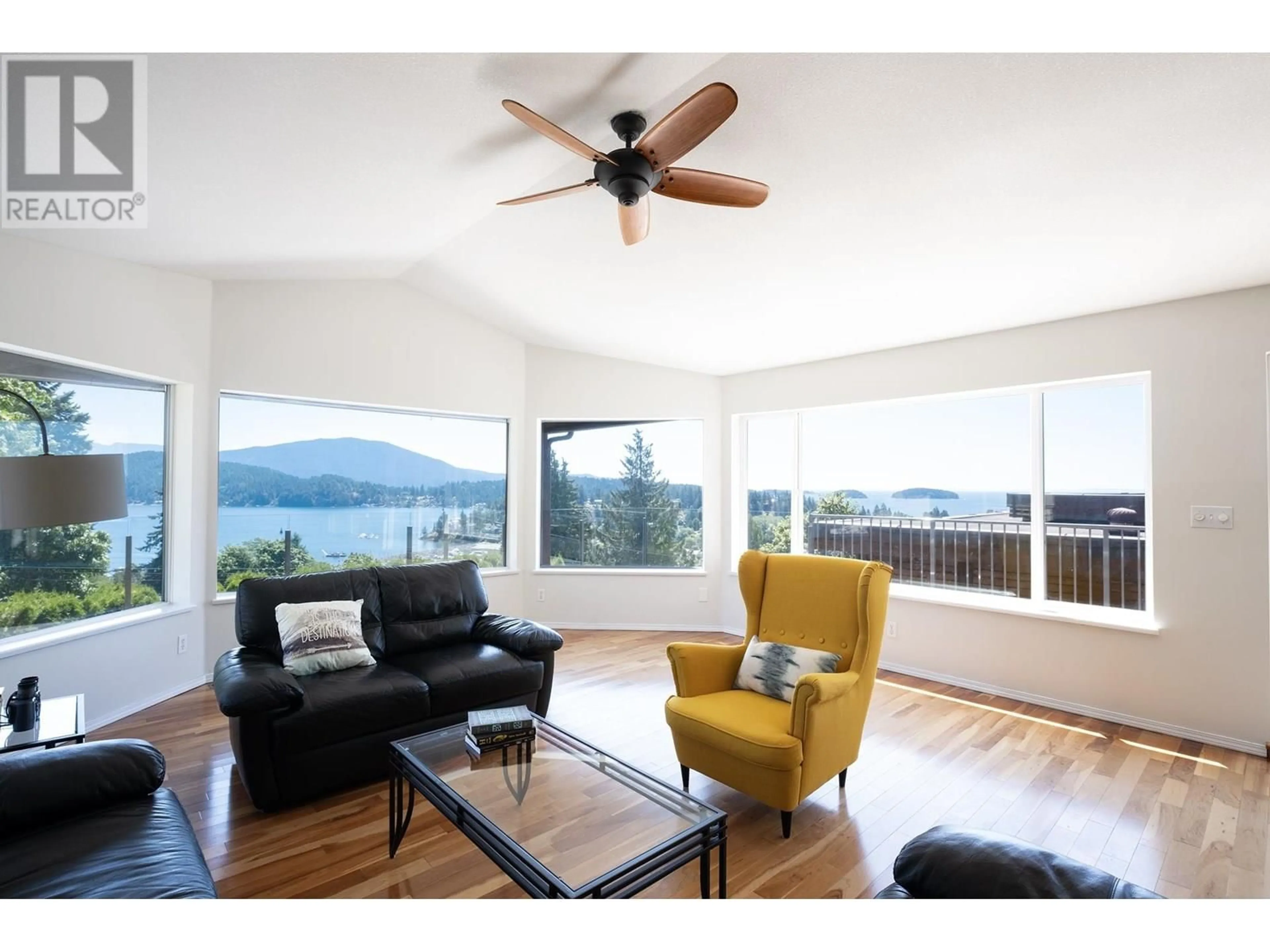 Living room with furniture, wood/laminate floor for 485 ABBS ROAD, Gibsons British Columbia V0N1V0