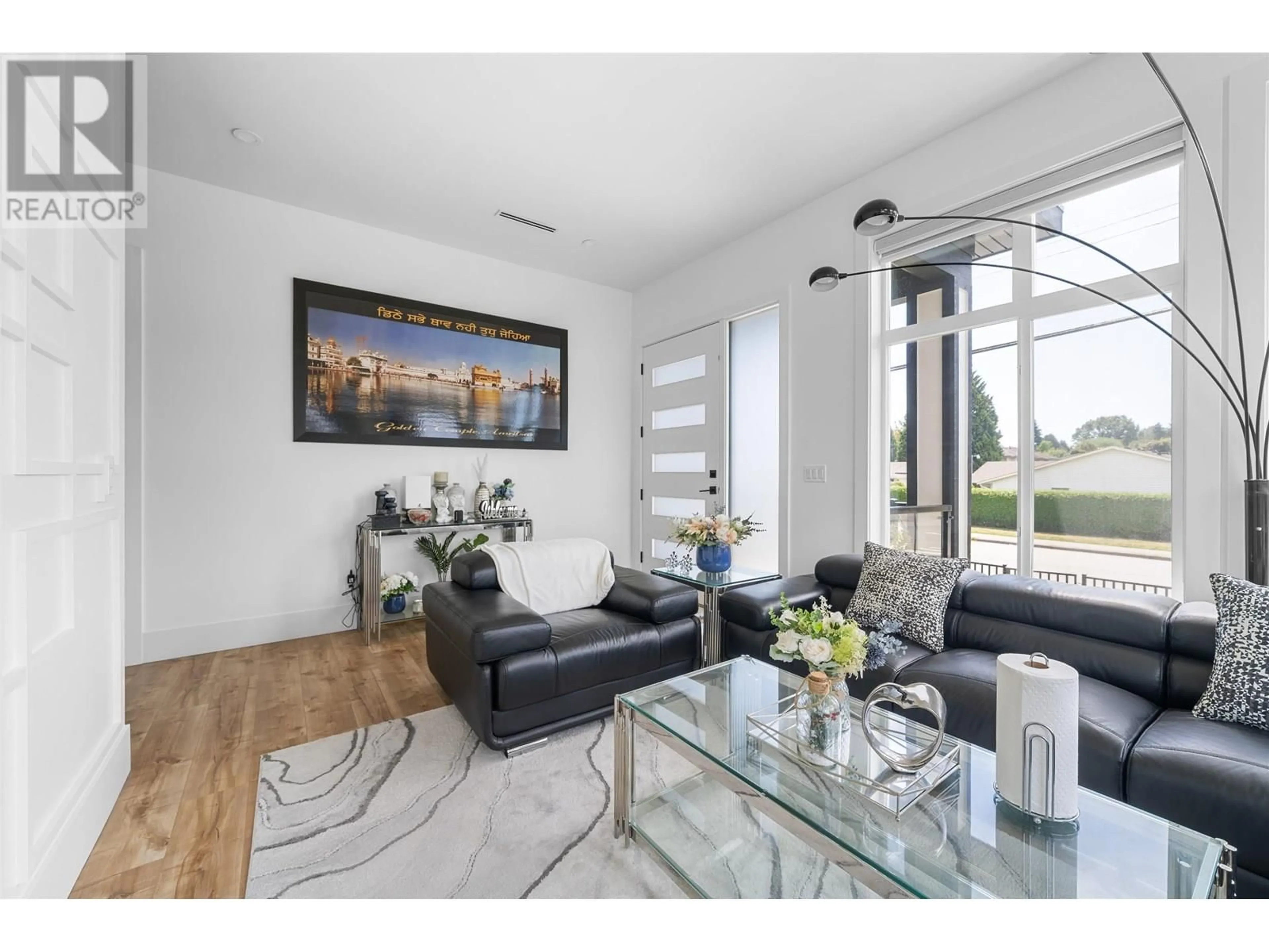 Living room with furniture, wood/laminate floor for 12310 189A STREET, Pitt Meadows British Columbia V3Y2H3