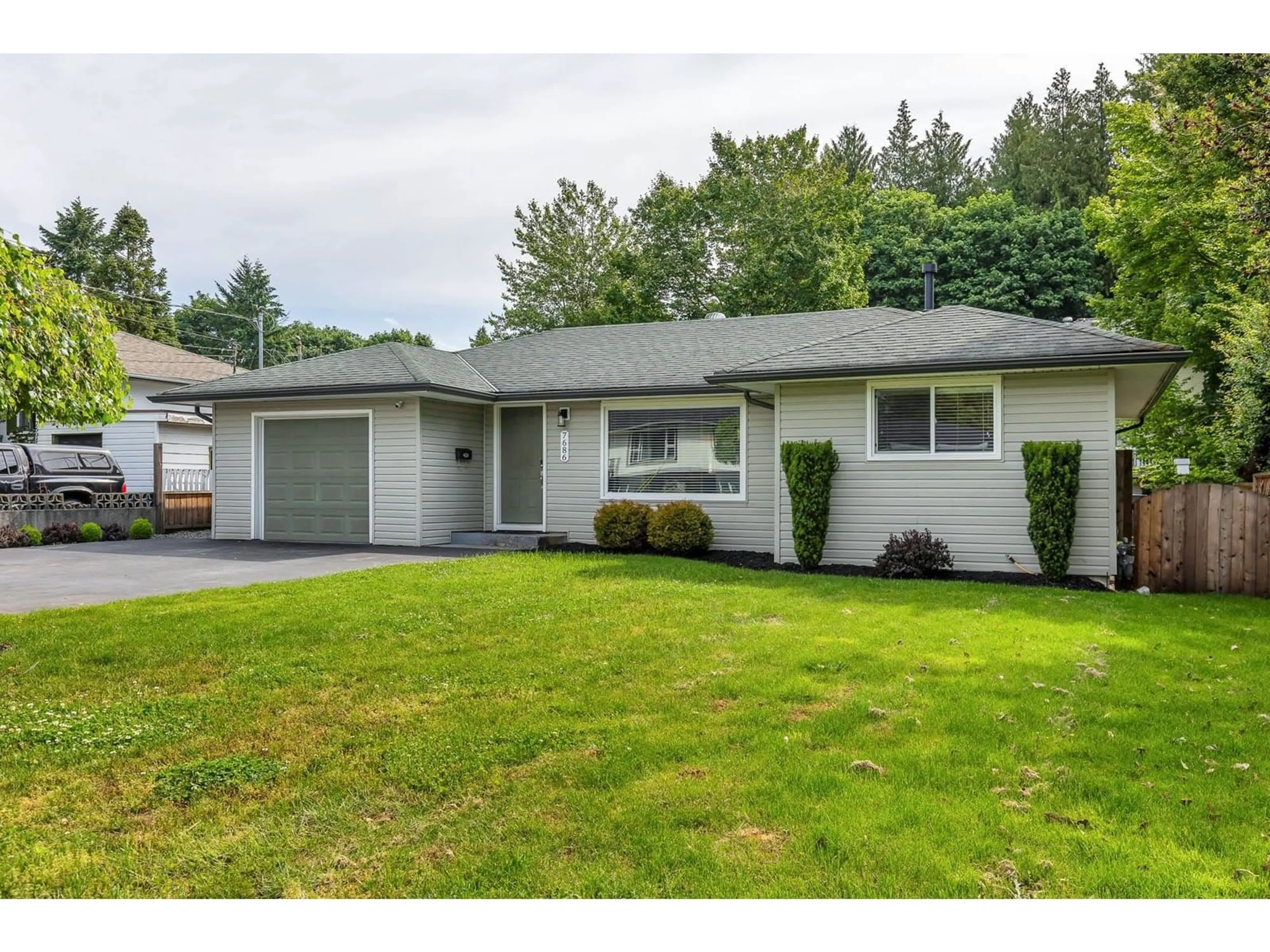 Home with vinyl exterior material, street for 7686 BLOTT, Mission British Columbia V2V3K3