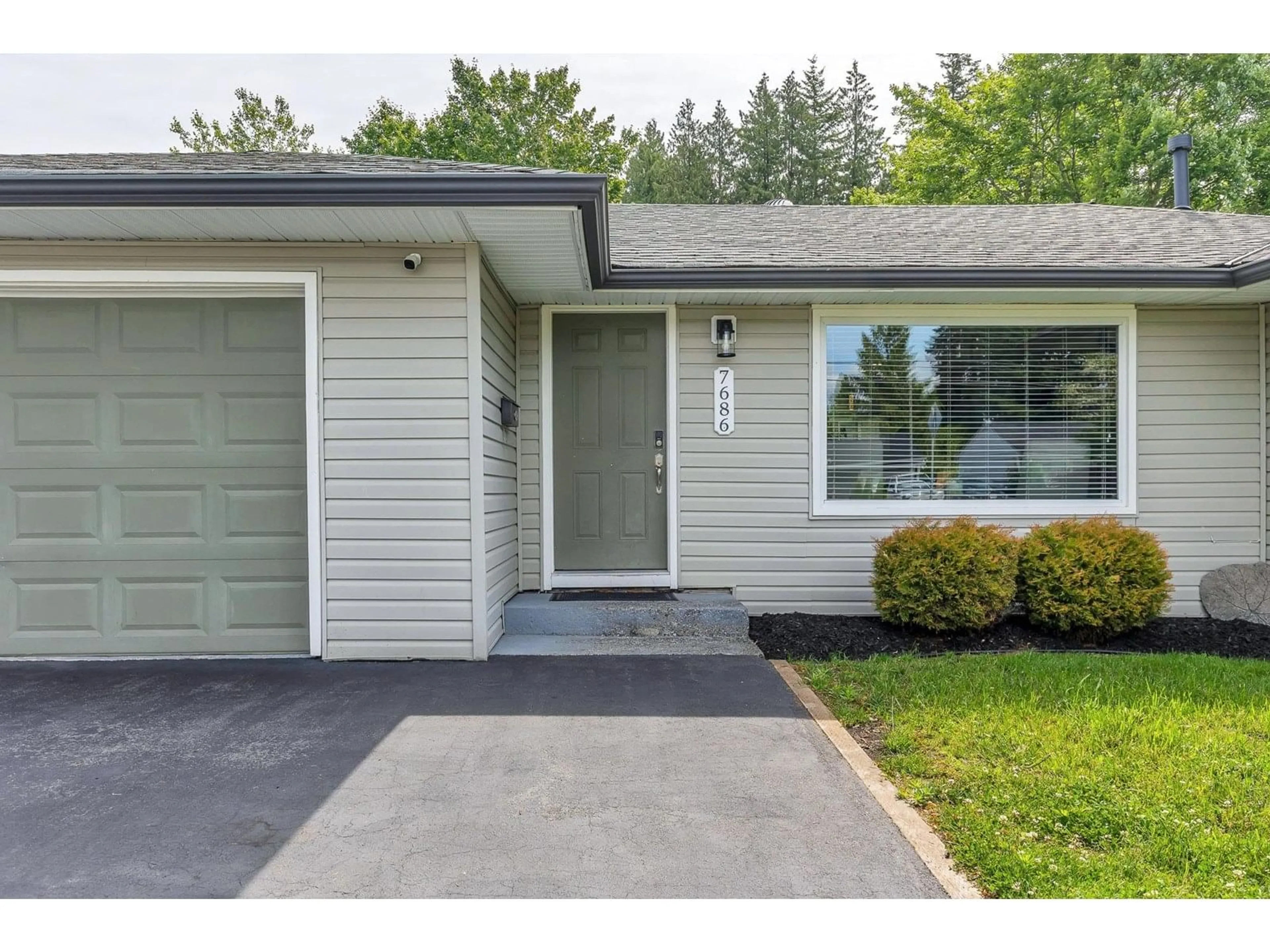 Home with vinyl exterior material, street for 7686 BLOTT, Mission British Columbia V2V3K3