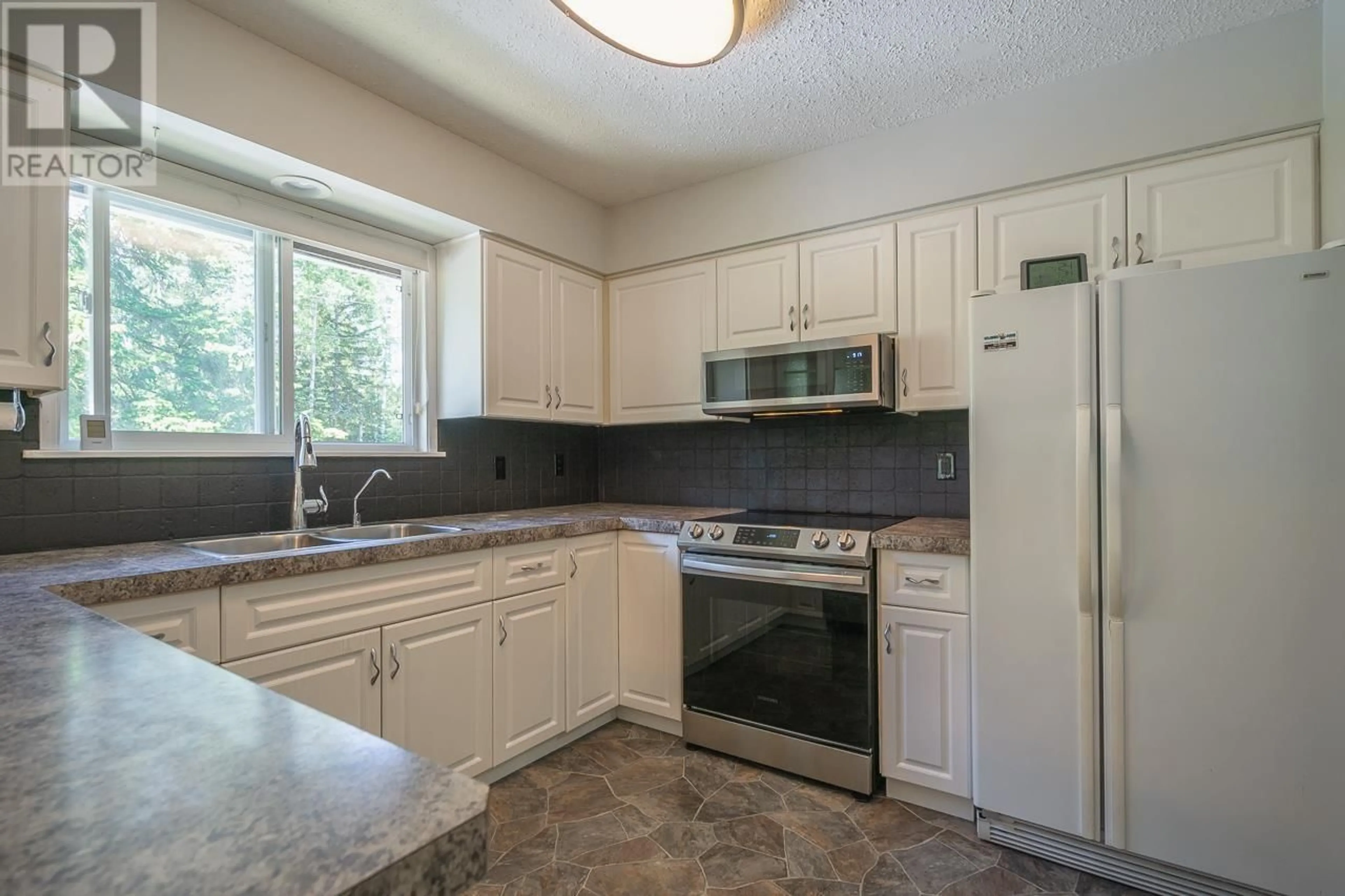 Standard kitchen, ceramic/tile floor for 6487 GREY CRESCENT, Horse Lake British Columbia V0K2E3