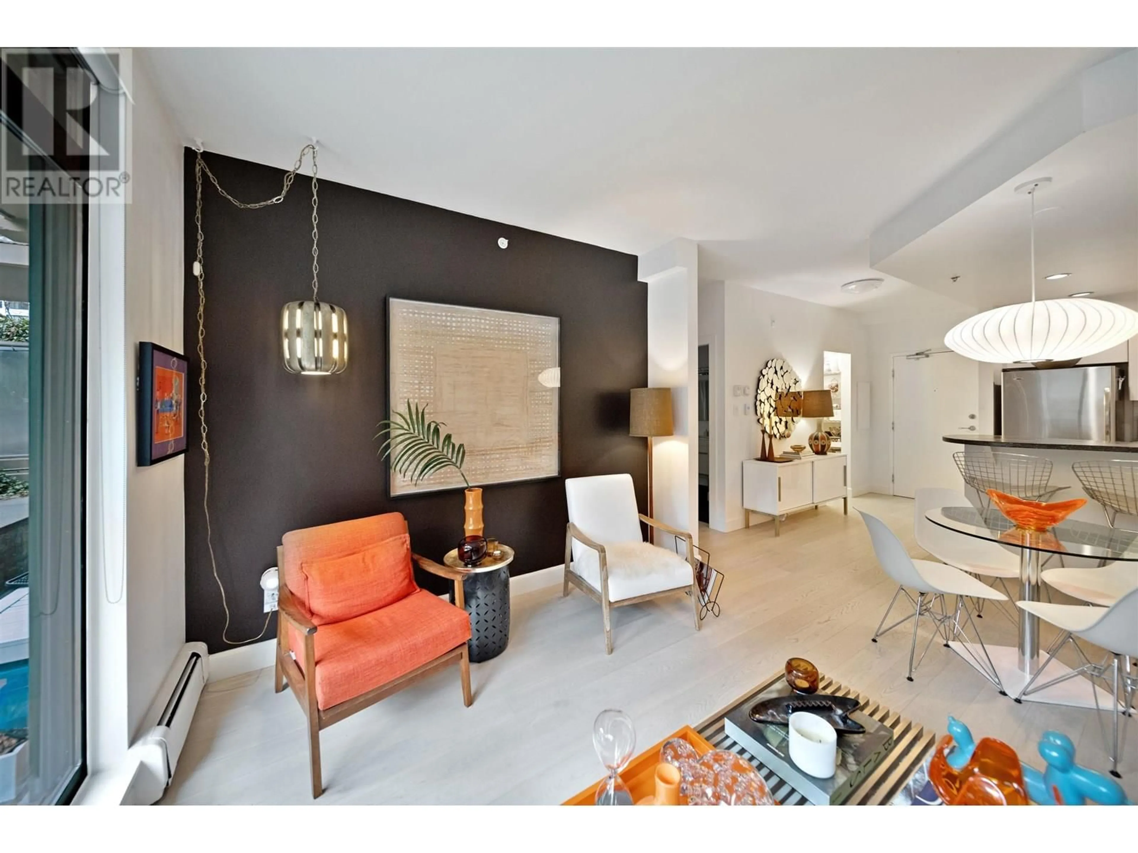 Living room with furniture, unknown for 104 - 1688 ROBSON STREET, Vancouver British Columbia V6G1C7