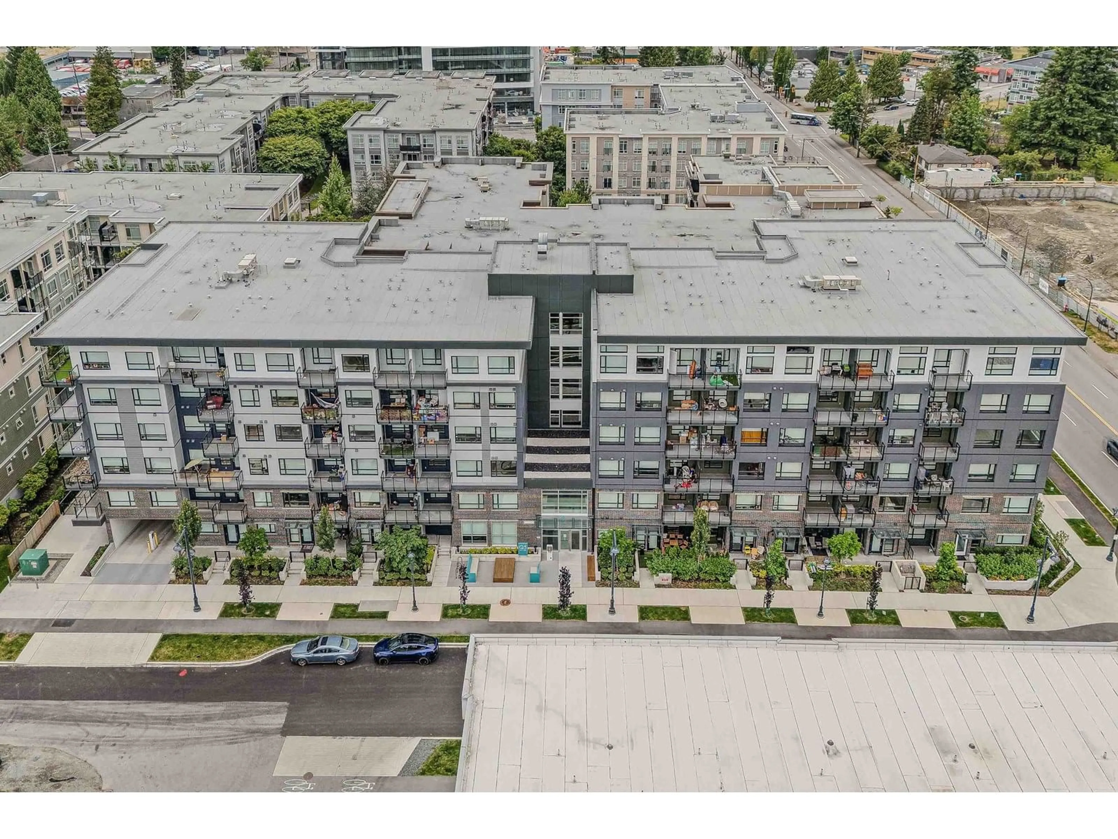A pic from outside/outdoor area/front of a property/back of a property/a pic from drone, unknown for 201 - 10777 138, Surrey British Columbia V3T0T5