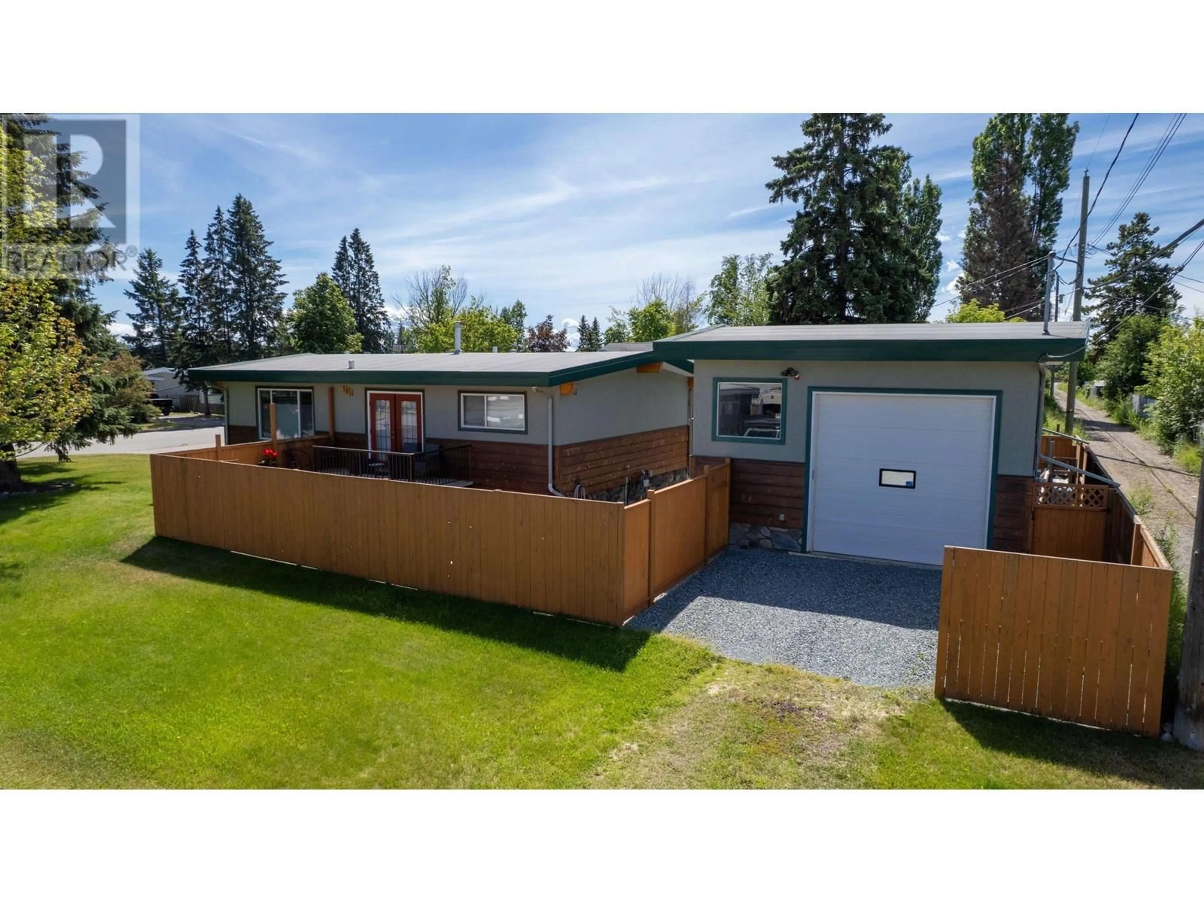 Home with vinyl exterior material, street for 305 KELLY STREET, Prince George British Columbia V2M3K4