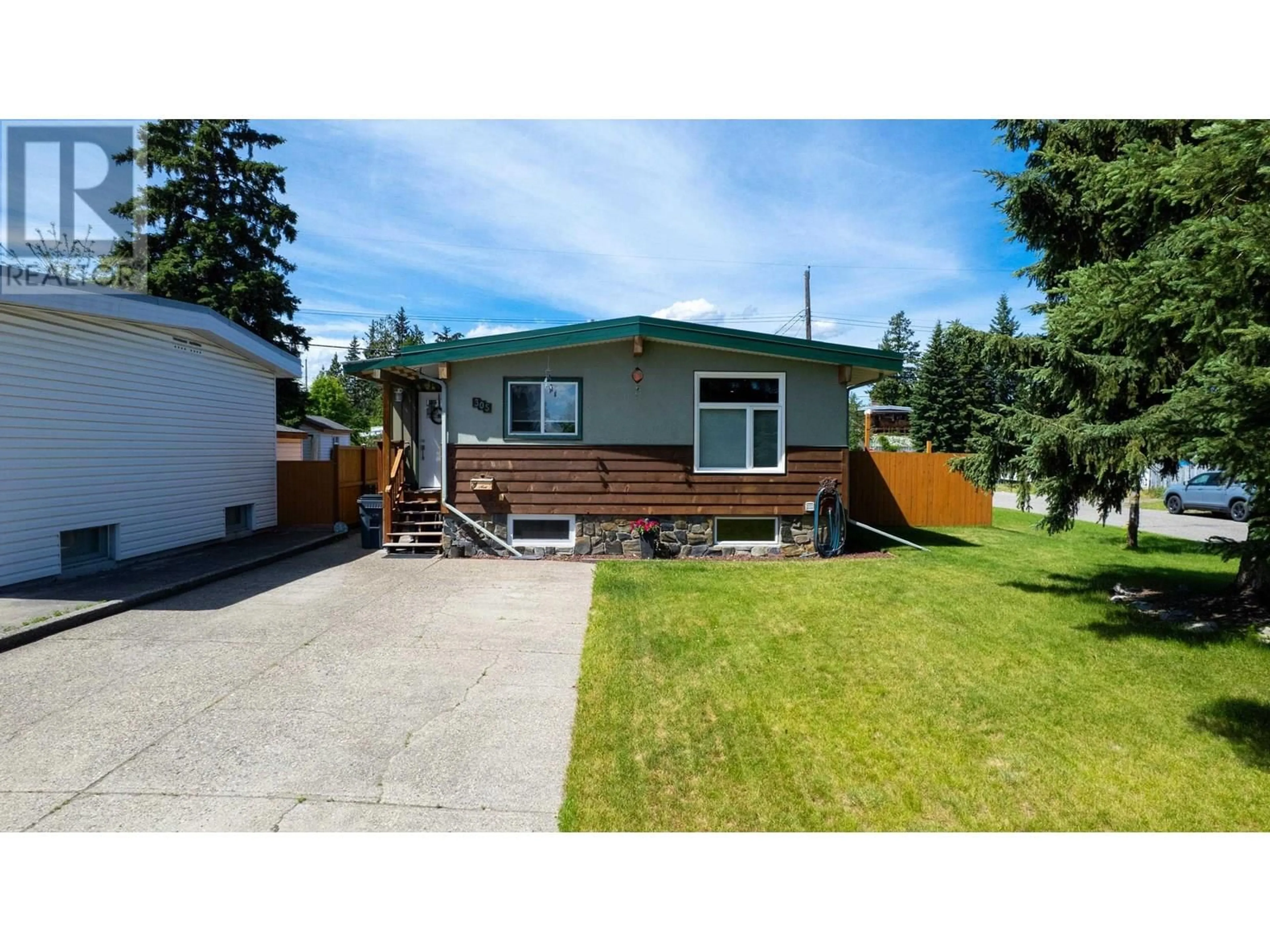 Home with vinyl exterior material, street for 305 KELLY STREET, Prince George British Columbia V2M3K4
