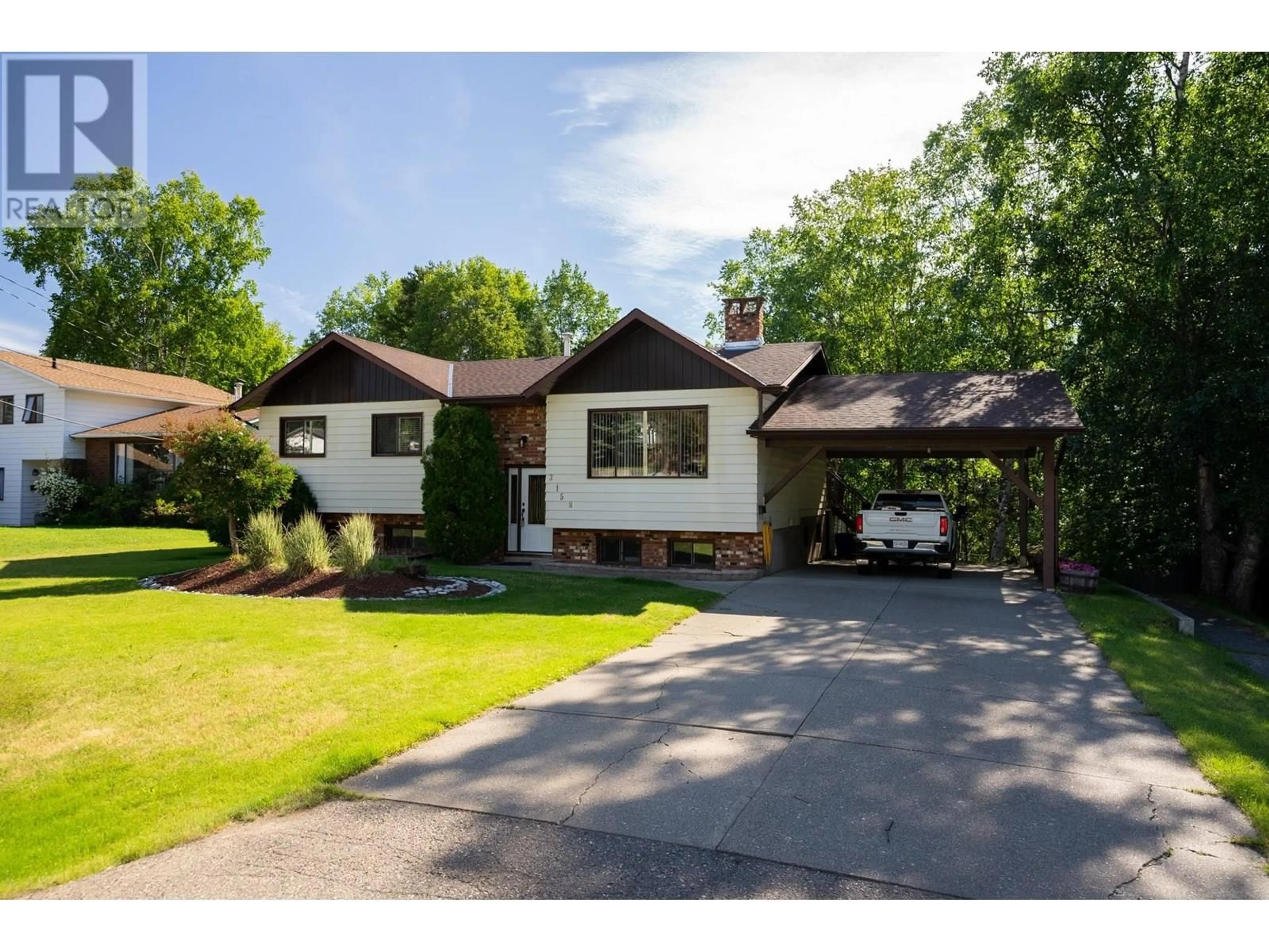 Home with brick exterior material, street for 3158 WALLACE CRESCENT, Prince George British Columbia V2K3R6
