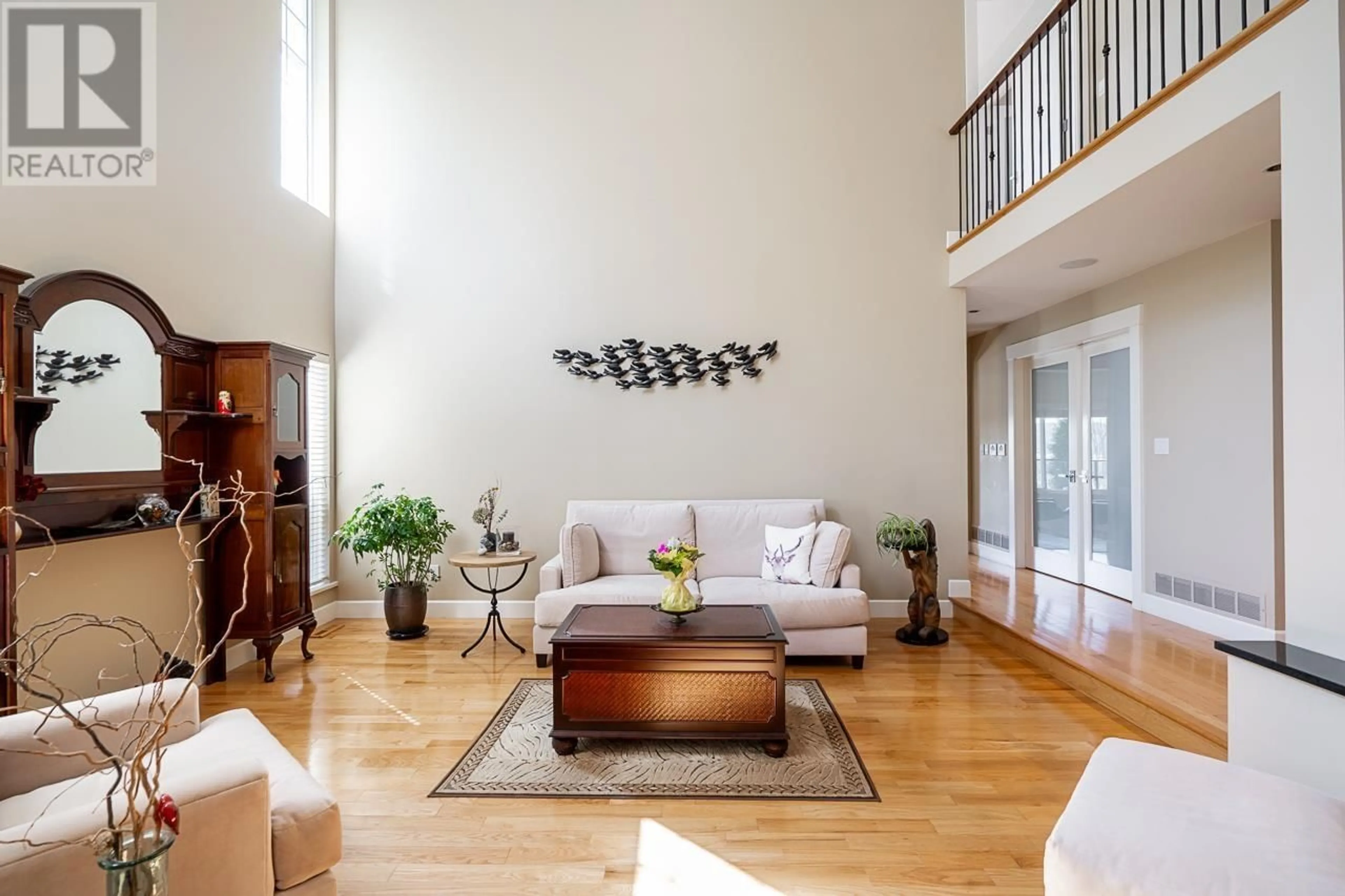 Living room with furniture, wood/laminate floor for 1740 IOCO ROAD, Port Moody British Columbia V3H3S8
