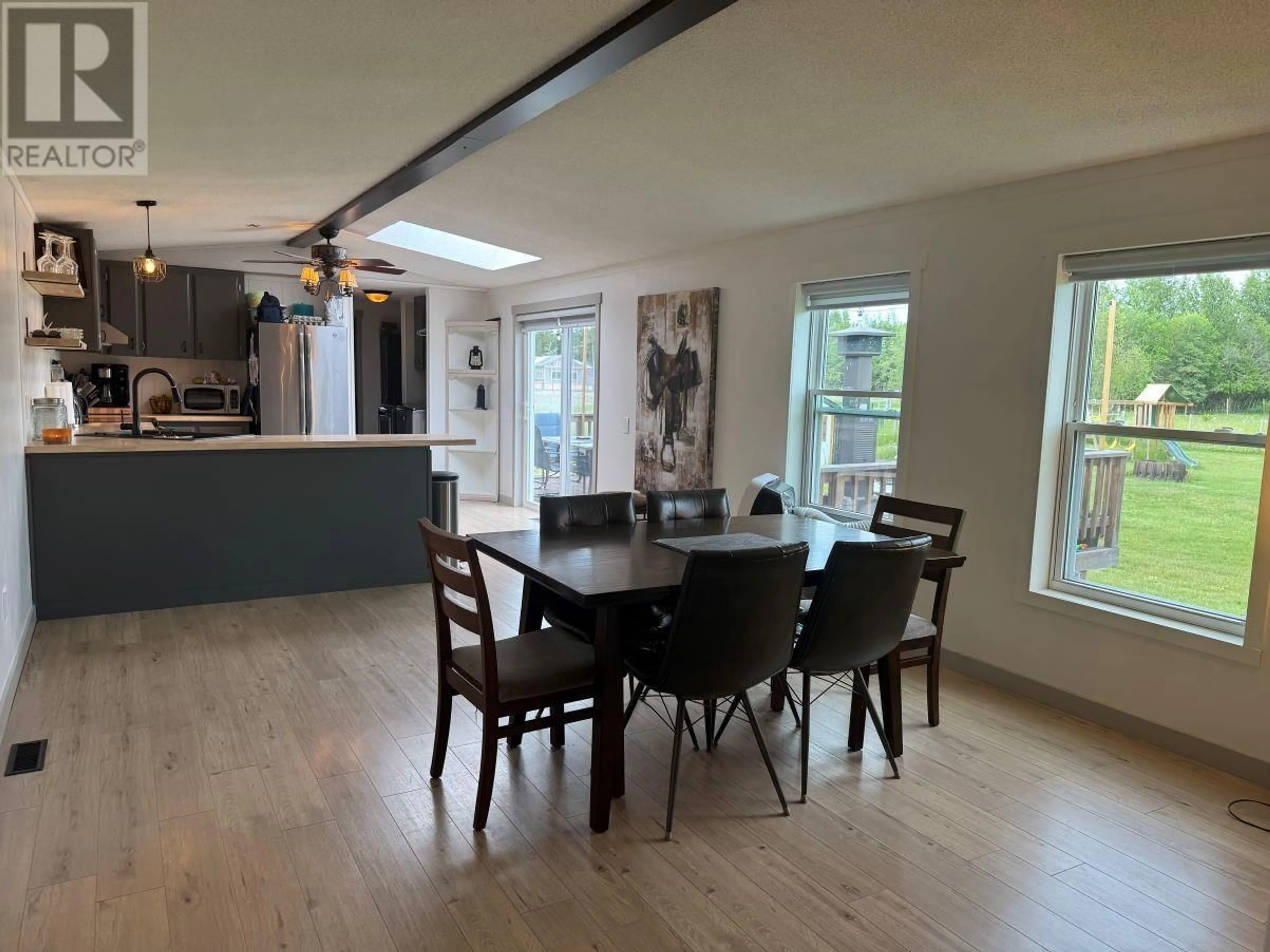 Open concept kitchen, wood/laminate floor for 6110 LAMBERTUS ROAD, Prince George British Columbia V2K5L8